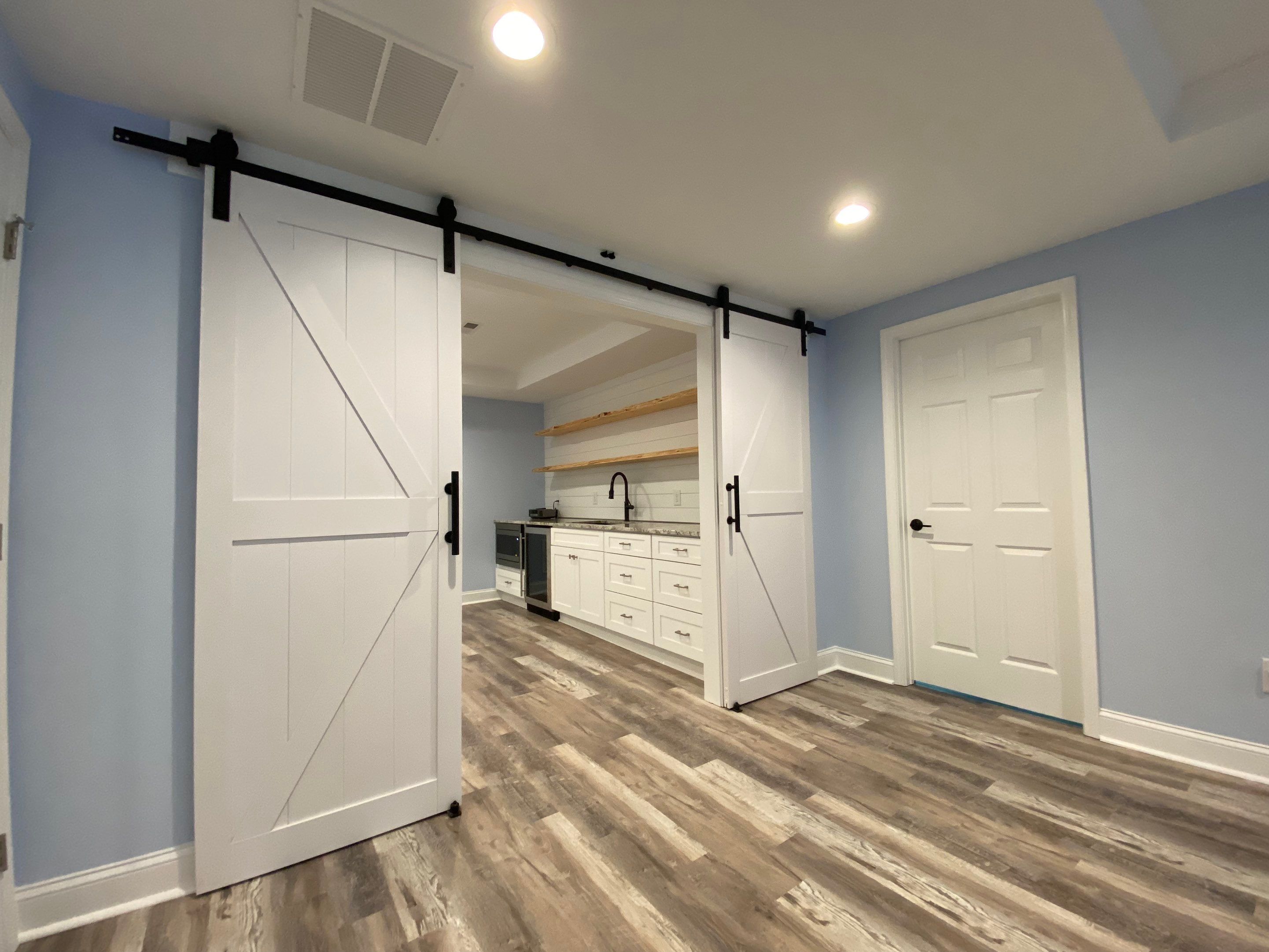 Marietta Basement Remodeling Featuring Custom Wet Bar and Marble Shower by Swift Home Renovations
