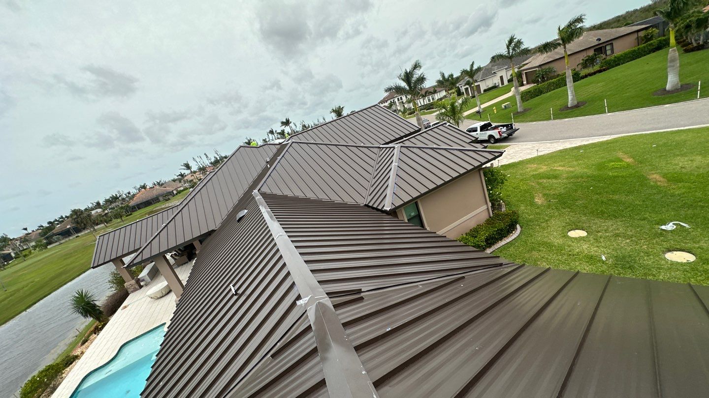 Residential Roofing Installation using Standing Seam Metal Roof in Cape Coral, FL by International Roofing