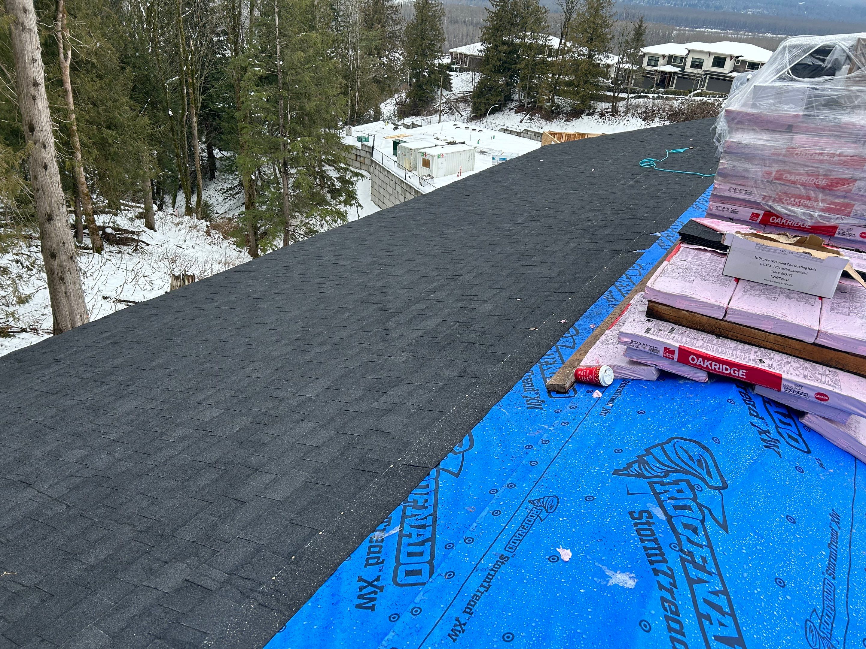 Residential Roofing Installation using OC Oakridge shingles by Top Notch Roofing Inc