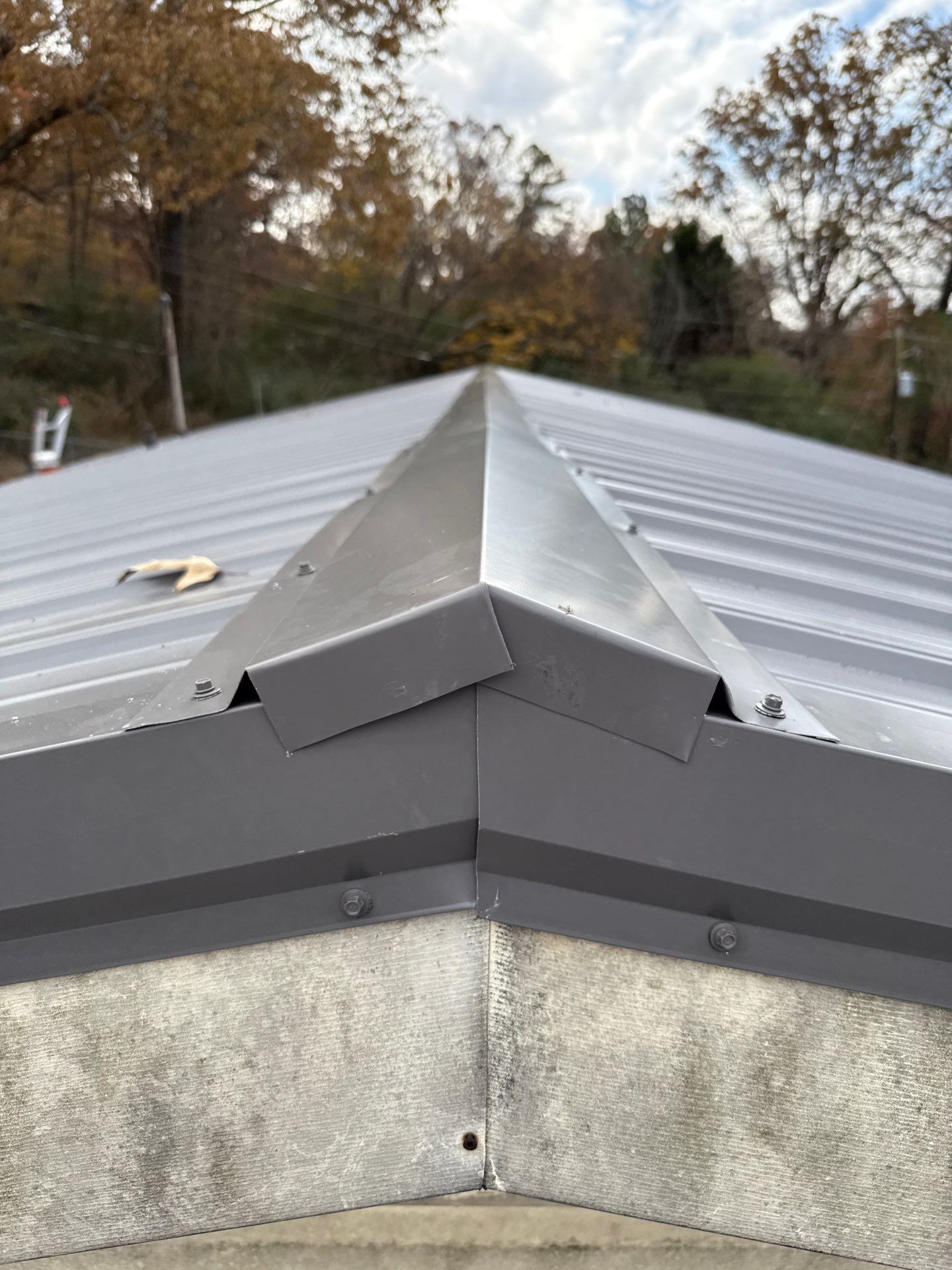 Roof Replacement in Pinson (Metal Roof) by The Roofing Dudes