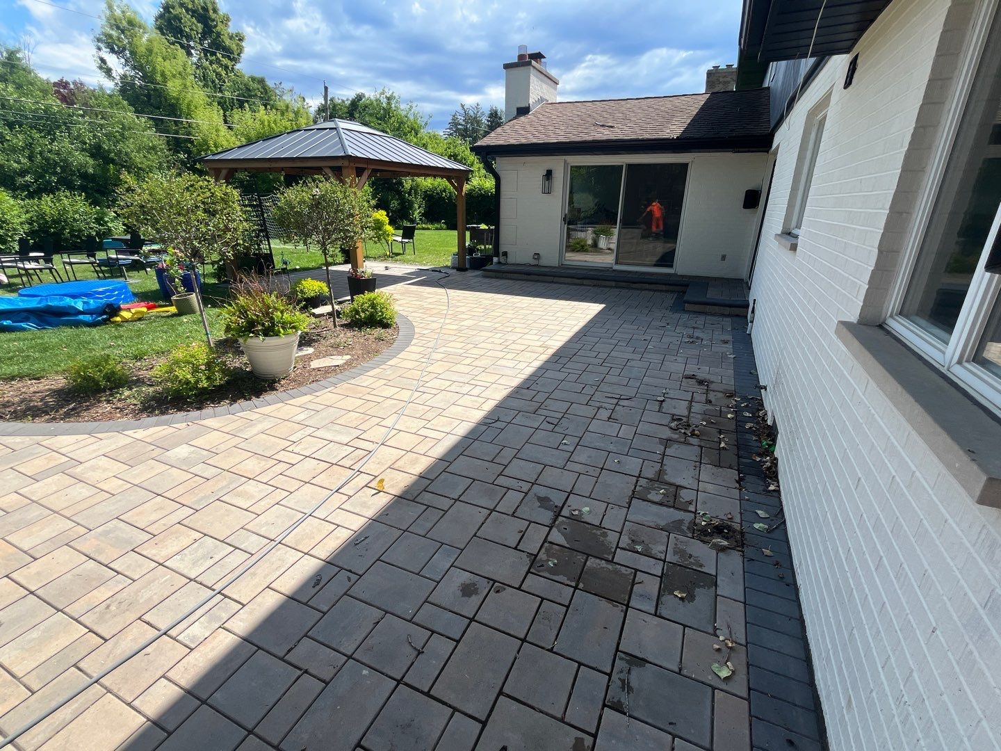 Brick paver repair, cleaning and sealing by Northern Power Washing LLC.
