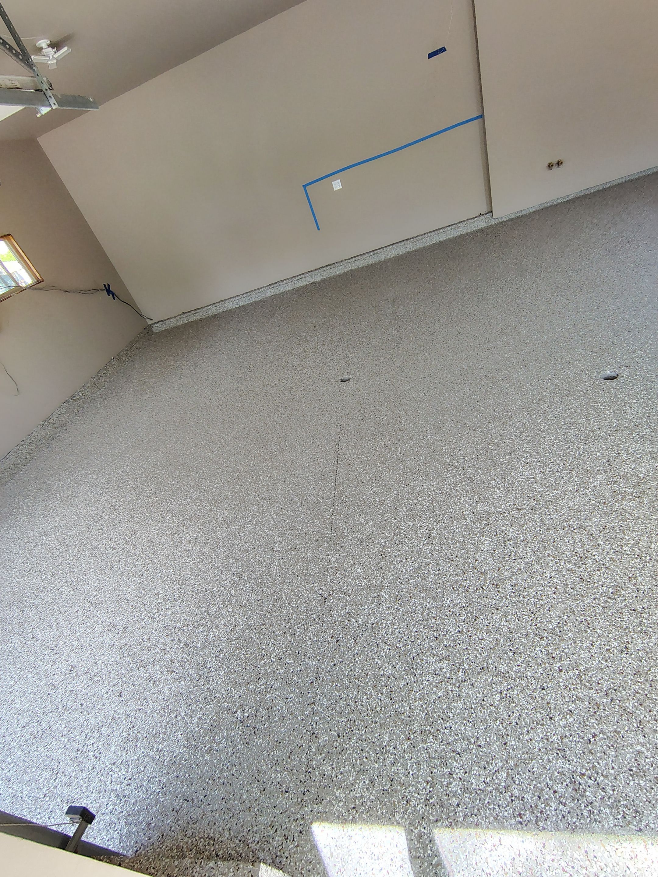 Sioux Falls Garage Concrete Repair and Epoxy Flake Floor Coating by Select Painting, Coatings & Garage Cabinets