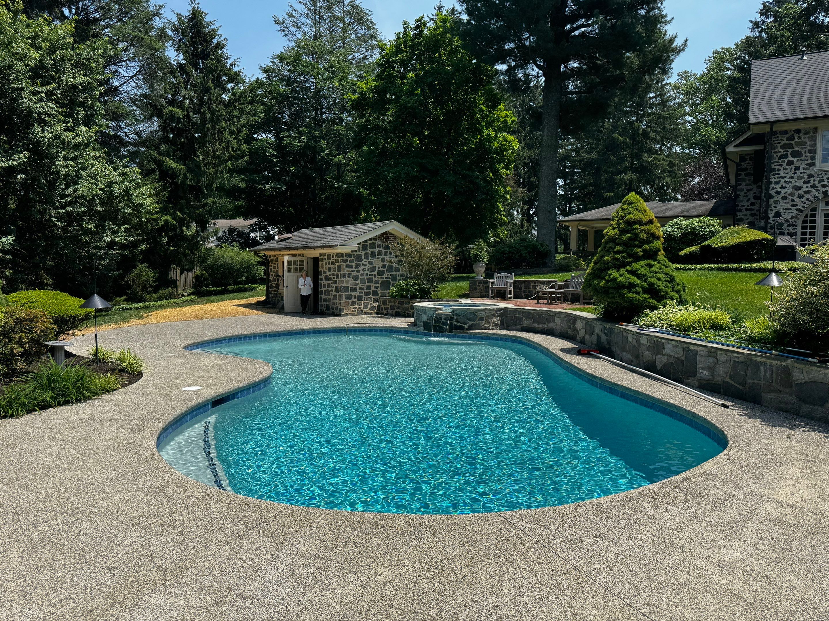 Exposed Aggregate Pool Deck Renovation in Villanova by Architectural Concrete Design