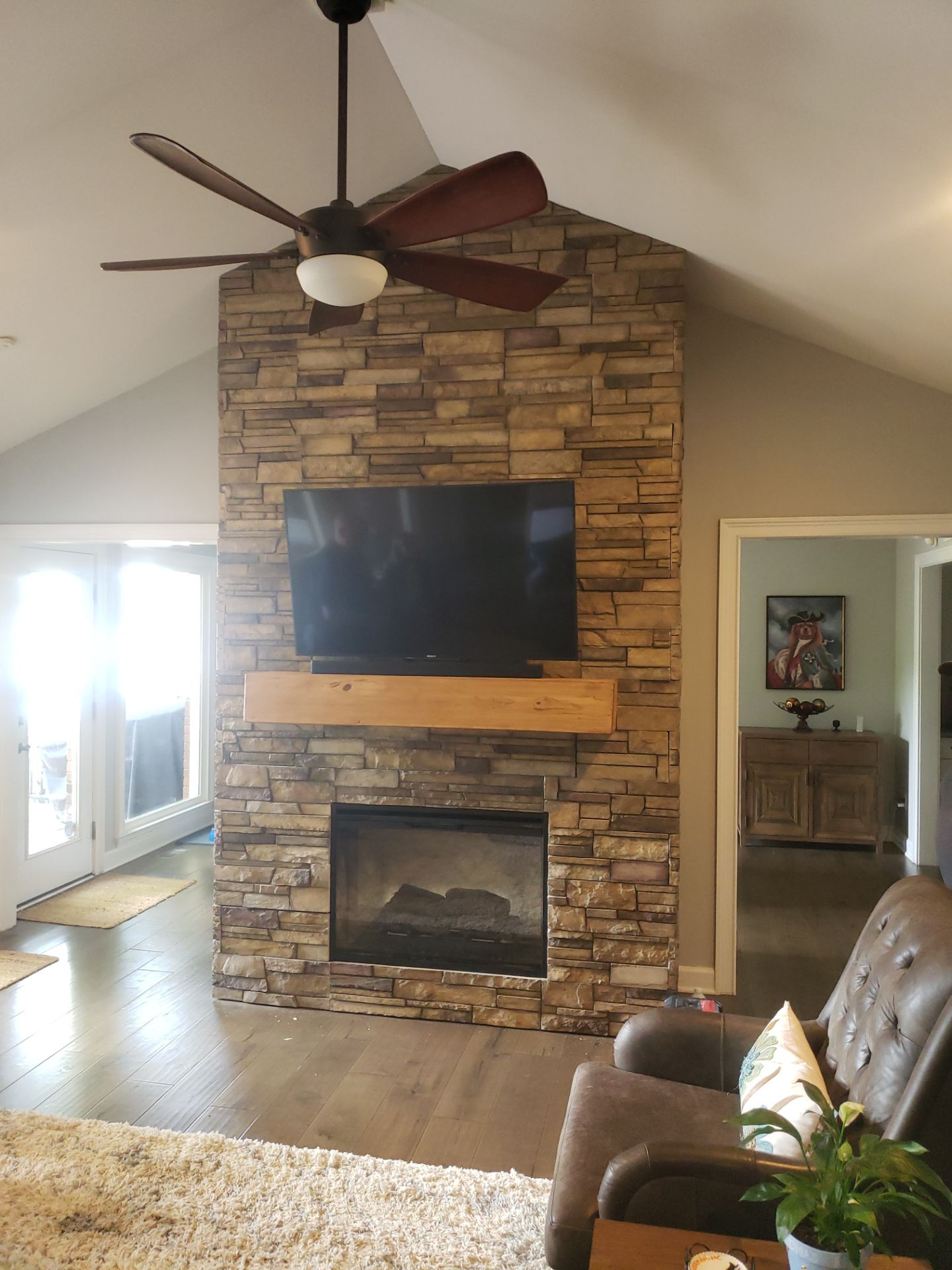 A Fireplace Transformation That's Staggering! by A Step Above Handy LLC
