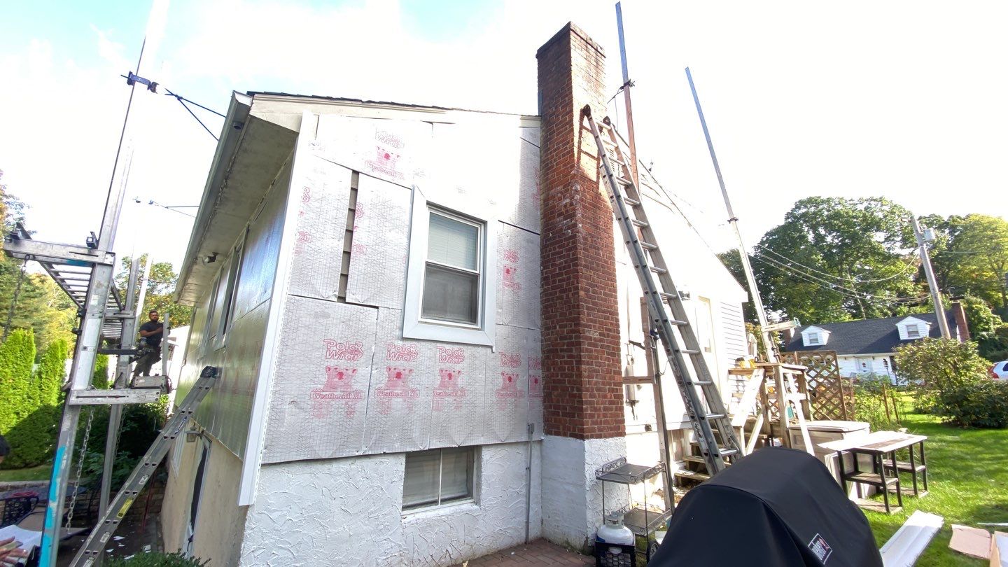 Siding Installation using CertainTeed monogram 4" double 4 Charcoal Gray by A Plus Exterior