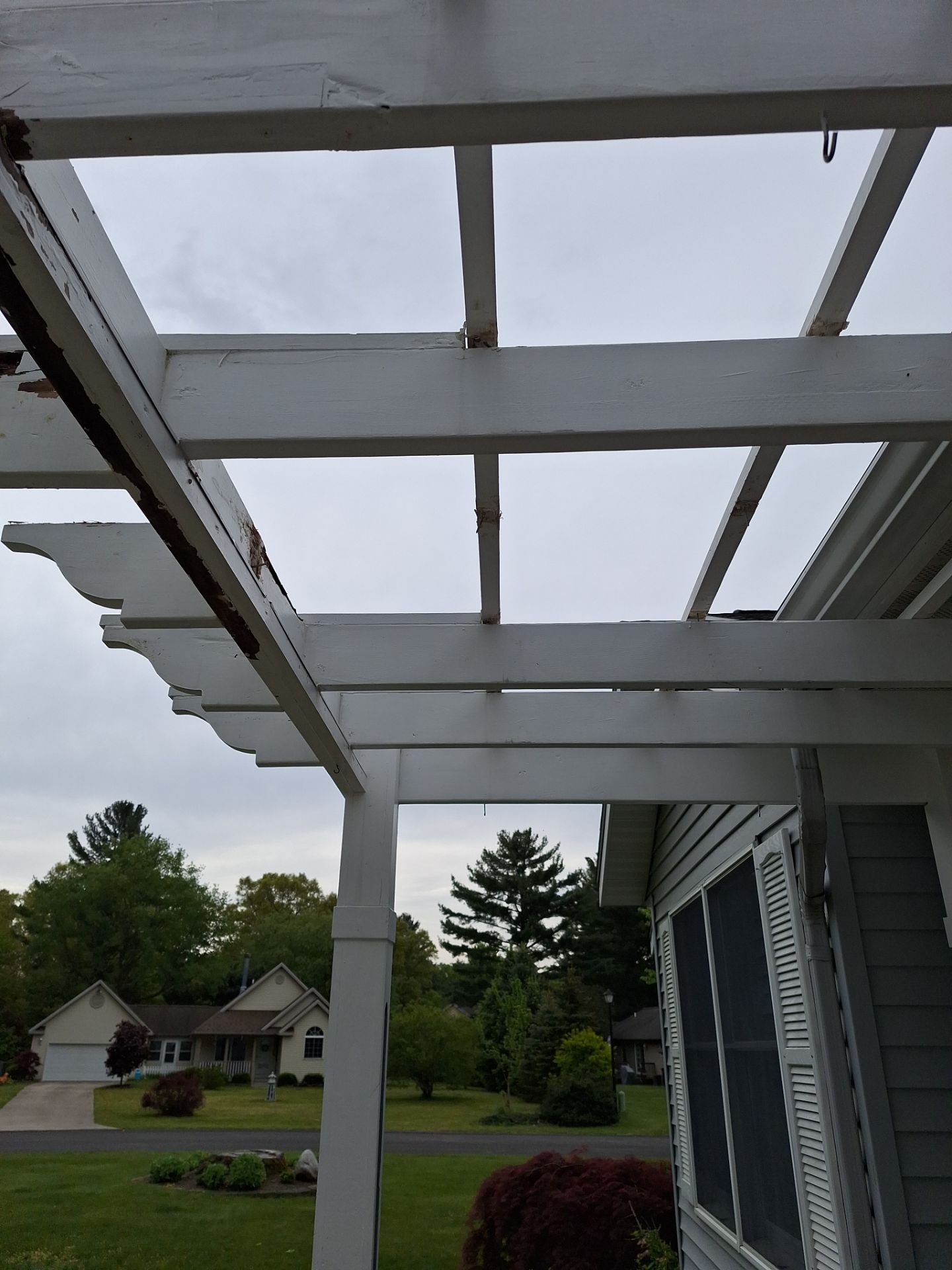 Repaint bedroom furniture, Pergola, and doors. Stain decking by Gordon Painting