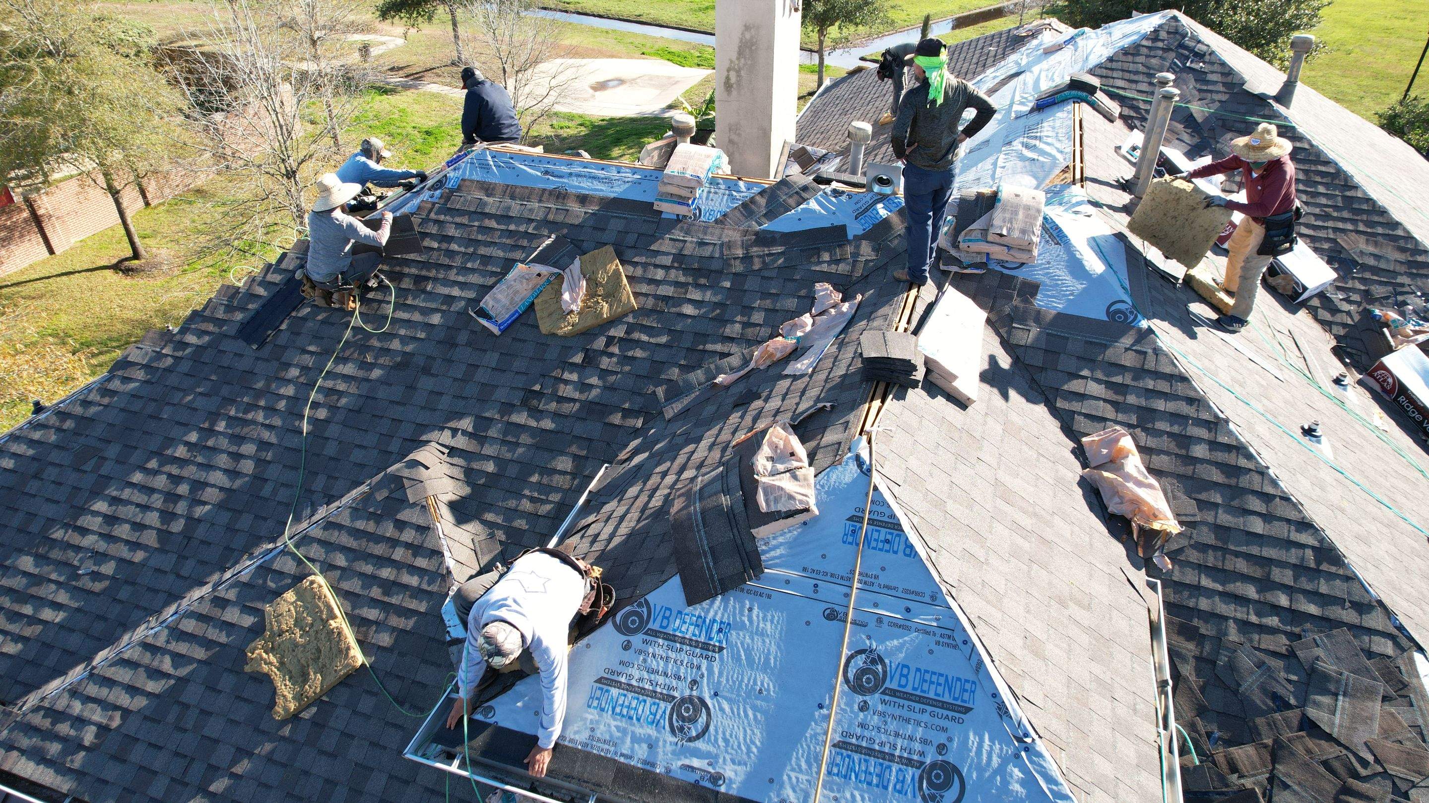 Two-Story Roof Replacement & Chimney Stucco Repair — Houston, TX by PL Roofing & SB Roofing, LLC.