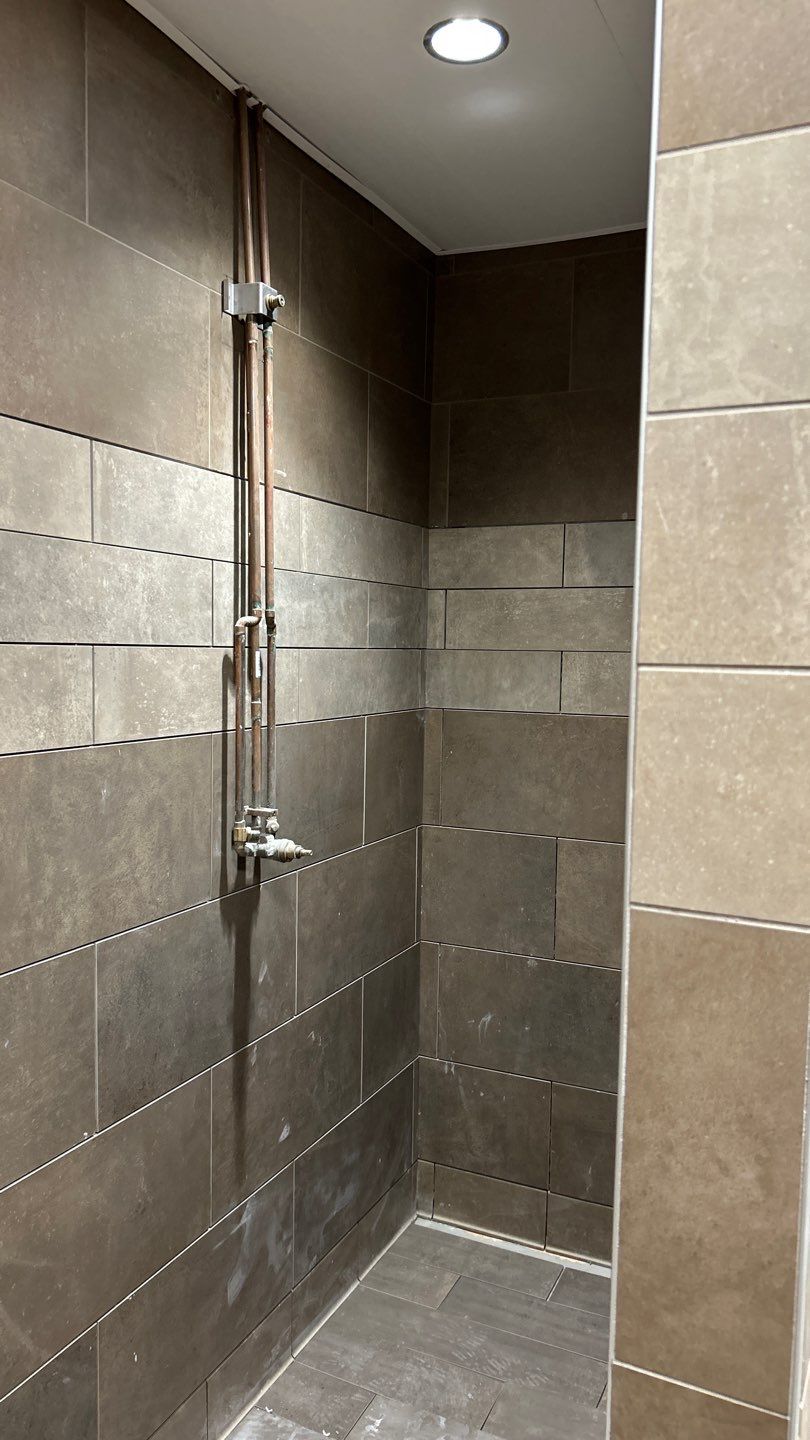 Trucking company showers by Footprints Floors of Nashville