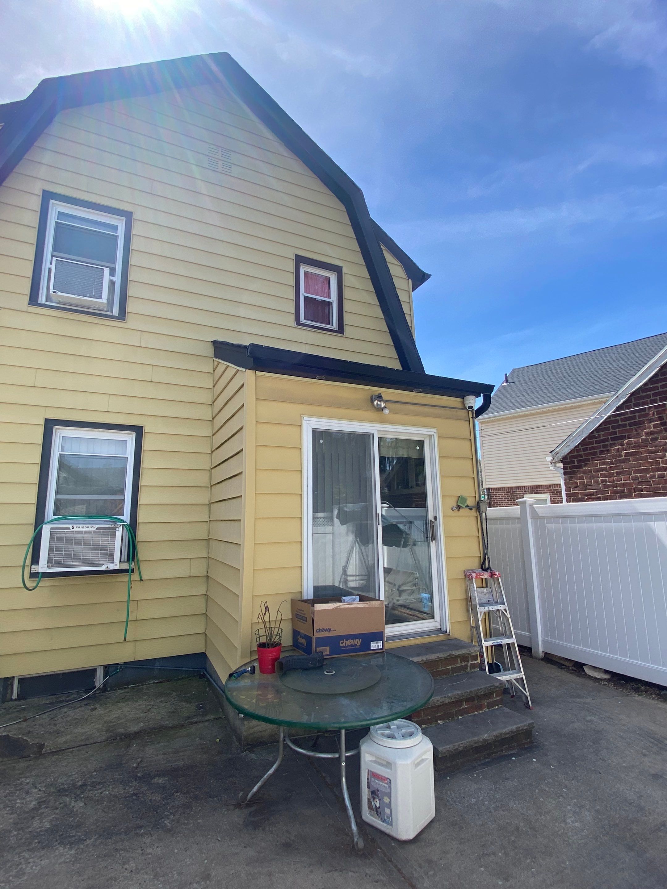 Full House Installation 5" black seamless gutters and 2x3 leaders using 5" black K style seamless gutters and 2x3 black leaders by Above All Gutters 