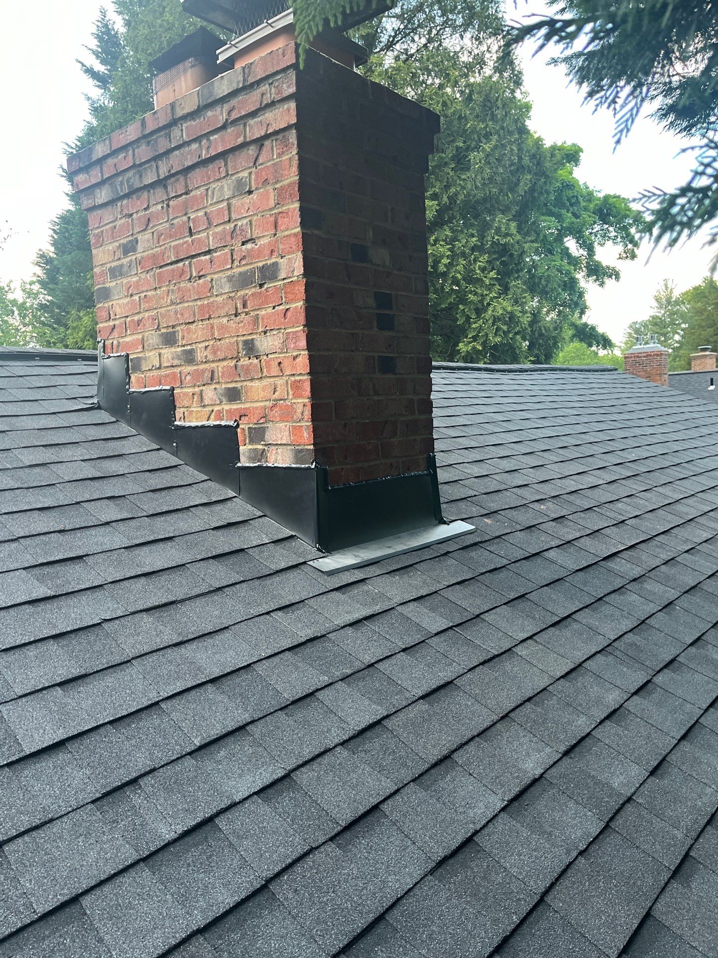 Burke: CertainTeed Landmark Designer Shingles in Moire Black by RM Banning, Inc.