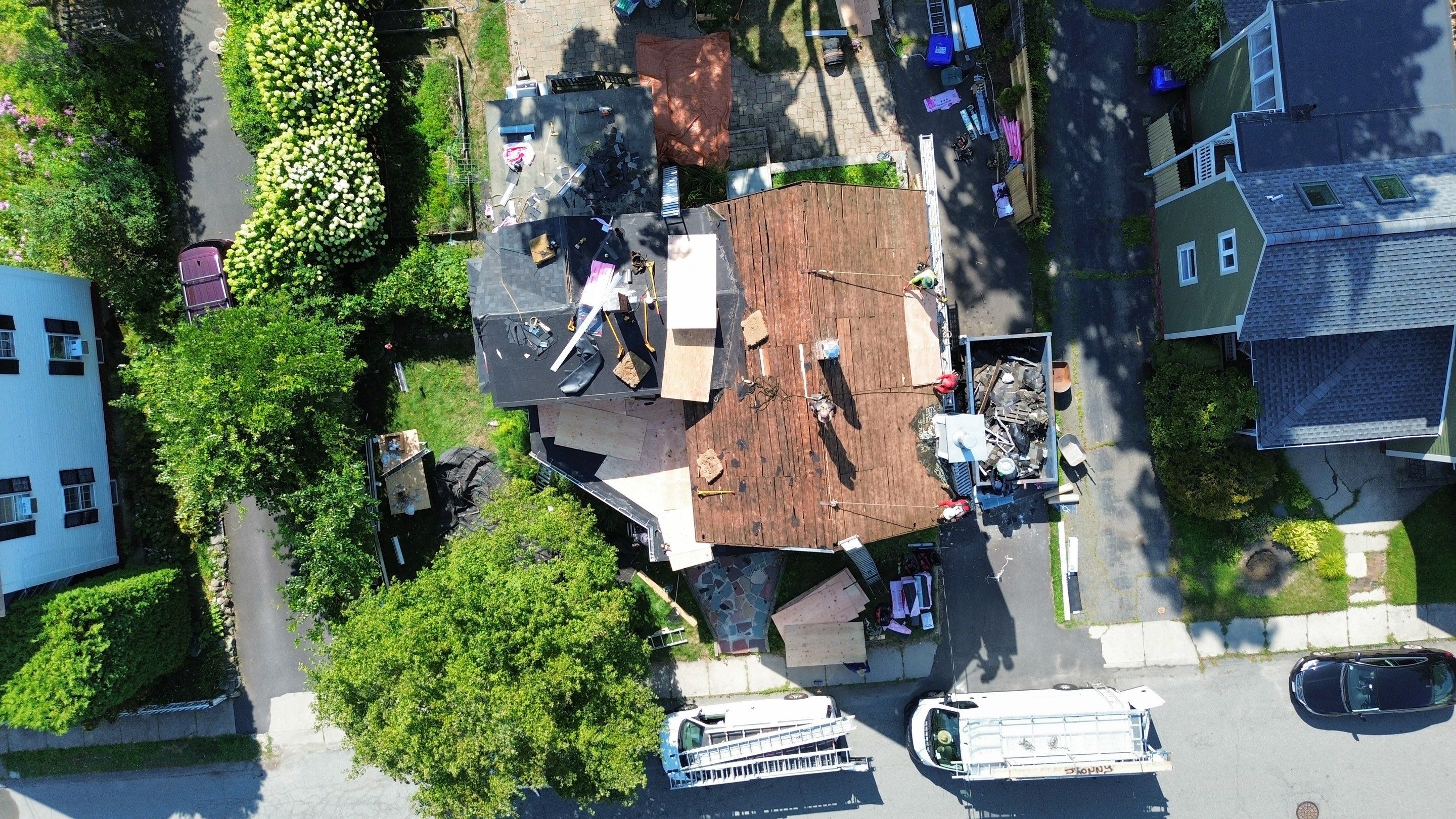 Full Roof Replacement + Custom Gutter Install | Onyx Black Finish by Mighty Dog Roofing of Greater Middlesex County