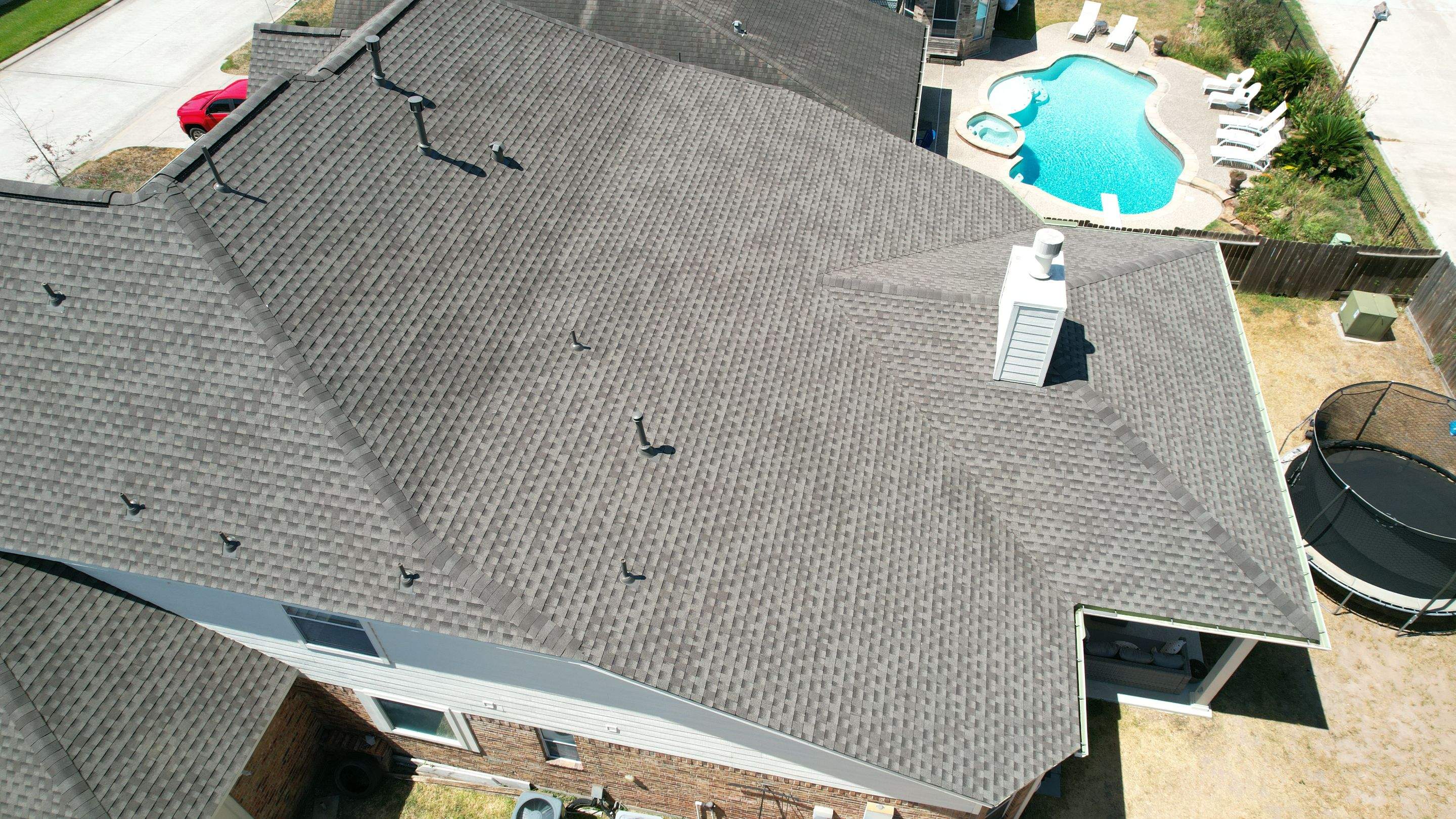 Brick Two-Story Roof Replacement, Tear-Off to Finish — Spring, TX by PL Roofing & SB Roofing, LLC.