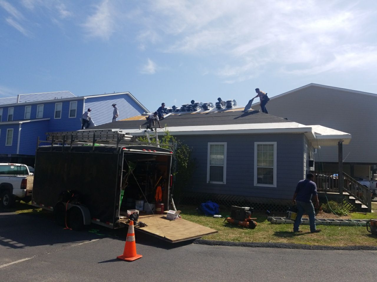 Residential Roofing Installation using Roof Replacement by American Roofing & Construction LLC