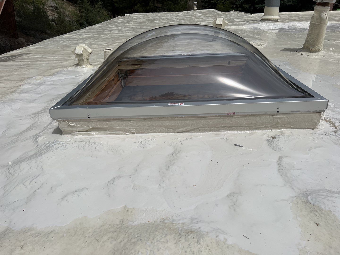 Commercial Roofing Installation using CASTAGRA ECODUR COATING by A to Z Roofing