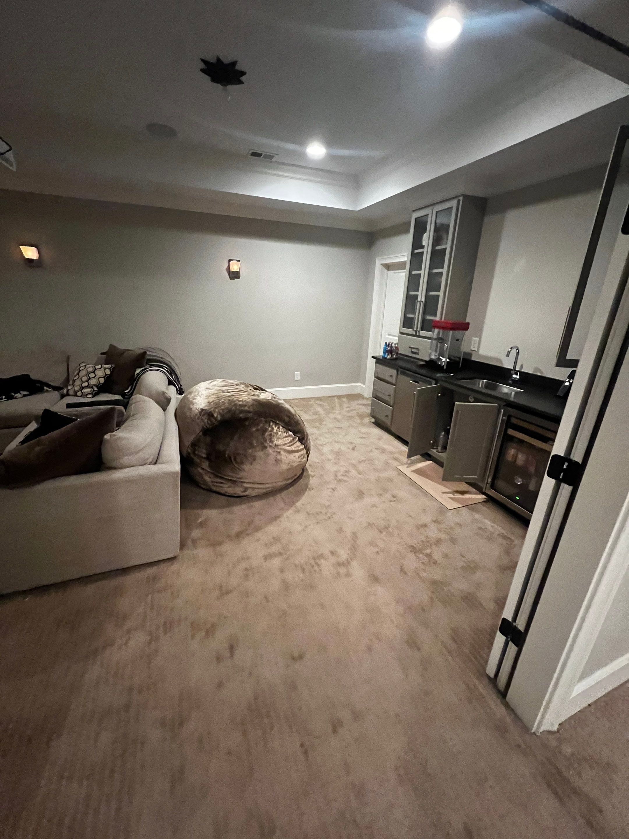Atlanta Basement Refinishing with Wood Laminate Flooring and Interior Painting by Swift Home Renovations