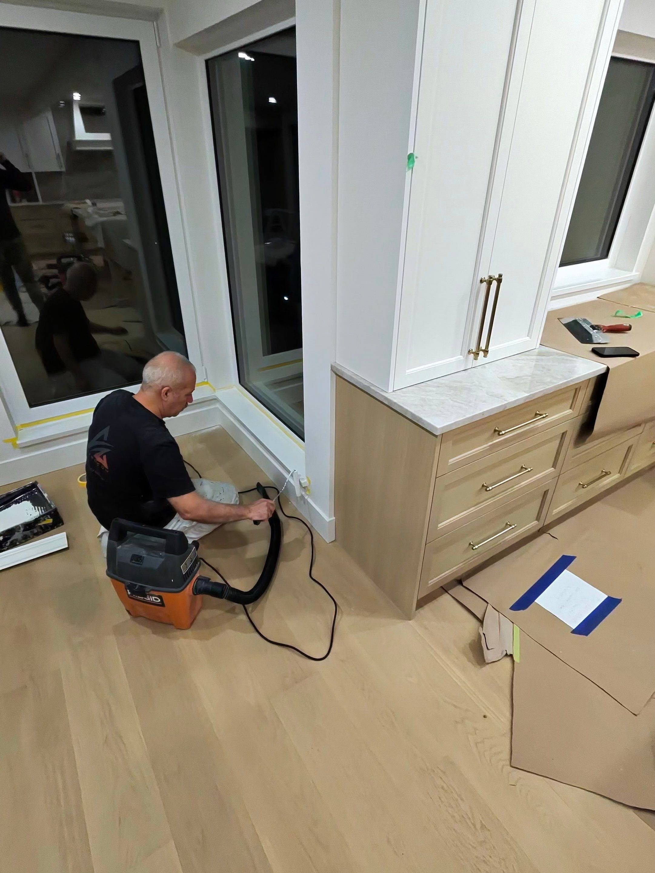 West Vancouver Custom Millwork: Heat Pump Trim & Window Finishing by YVR Construction Group