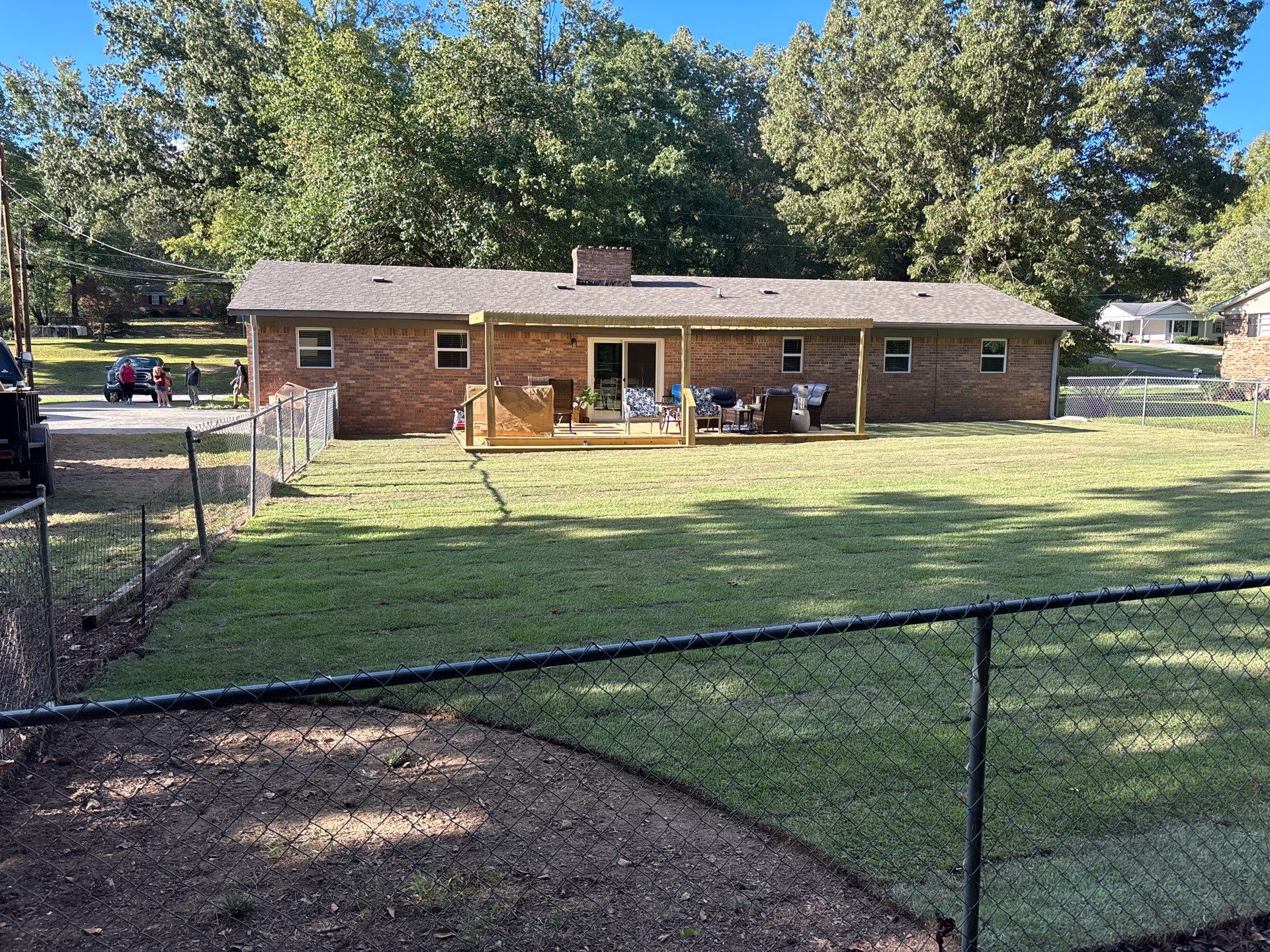 Front Entry Enhancements and a Back Deck Upgrade by Elite Proscapes LLC