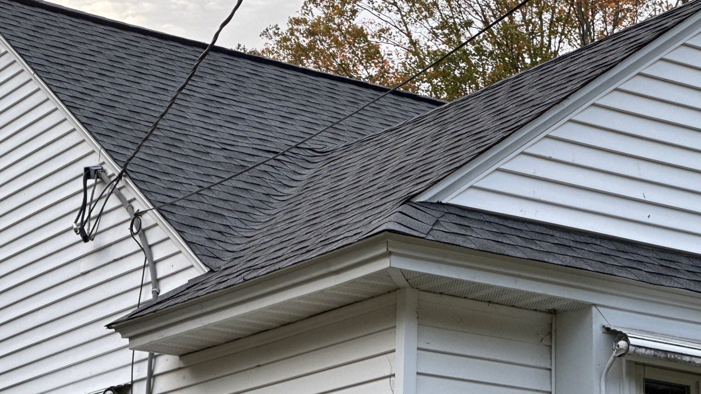 Complete Roof Replacement with GAF Pewter Gray HDZ™ Shingles, VELUX Skylights & New Gutters by Sensible Home Solutions