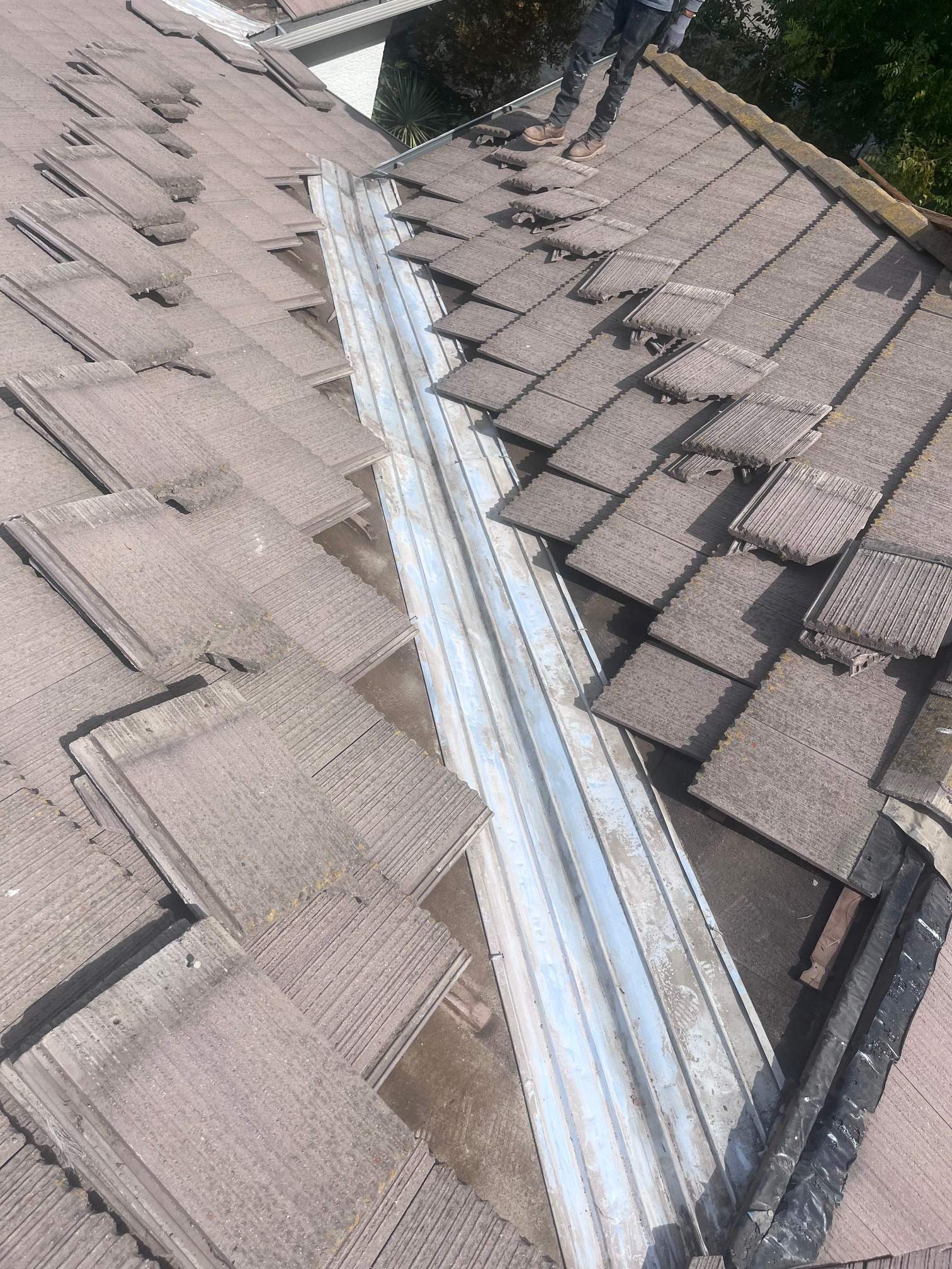 Tile Roof Repair by Grandmark Service Company