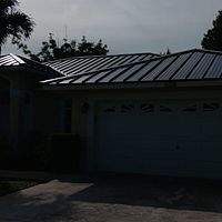 24ga 1.5" Mechanical Seam Matte Black by Total Roofing System The Metal Roof Experts