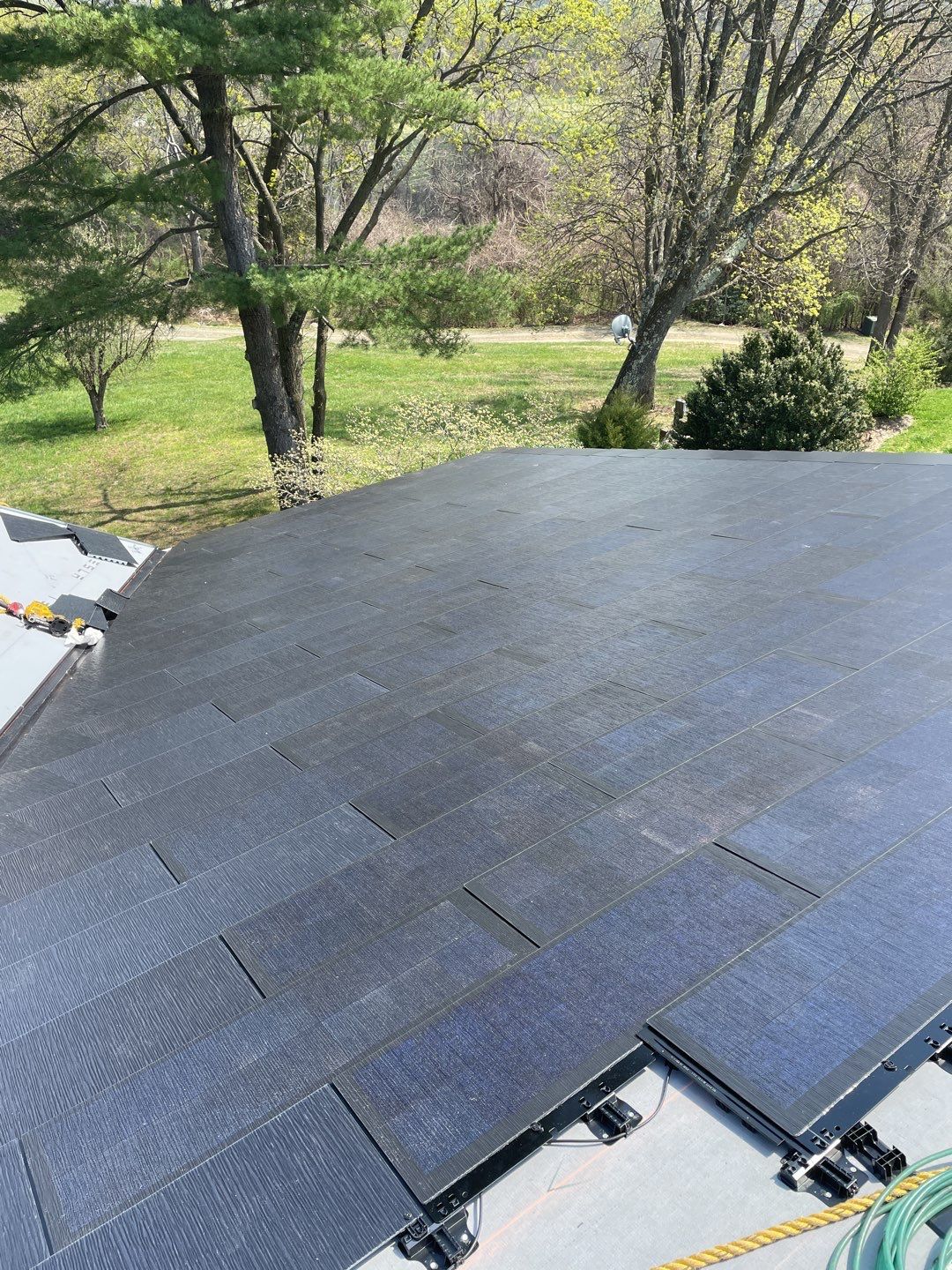 Tesla Solar Roof Replacement by American Home Contractors