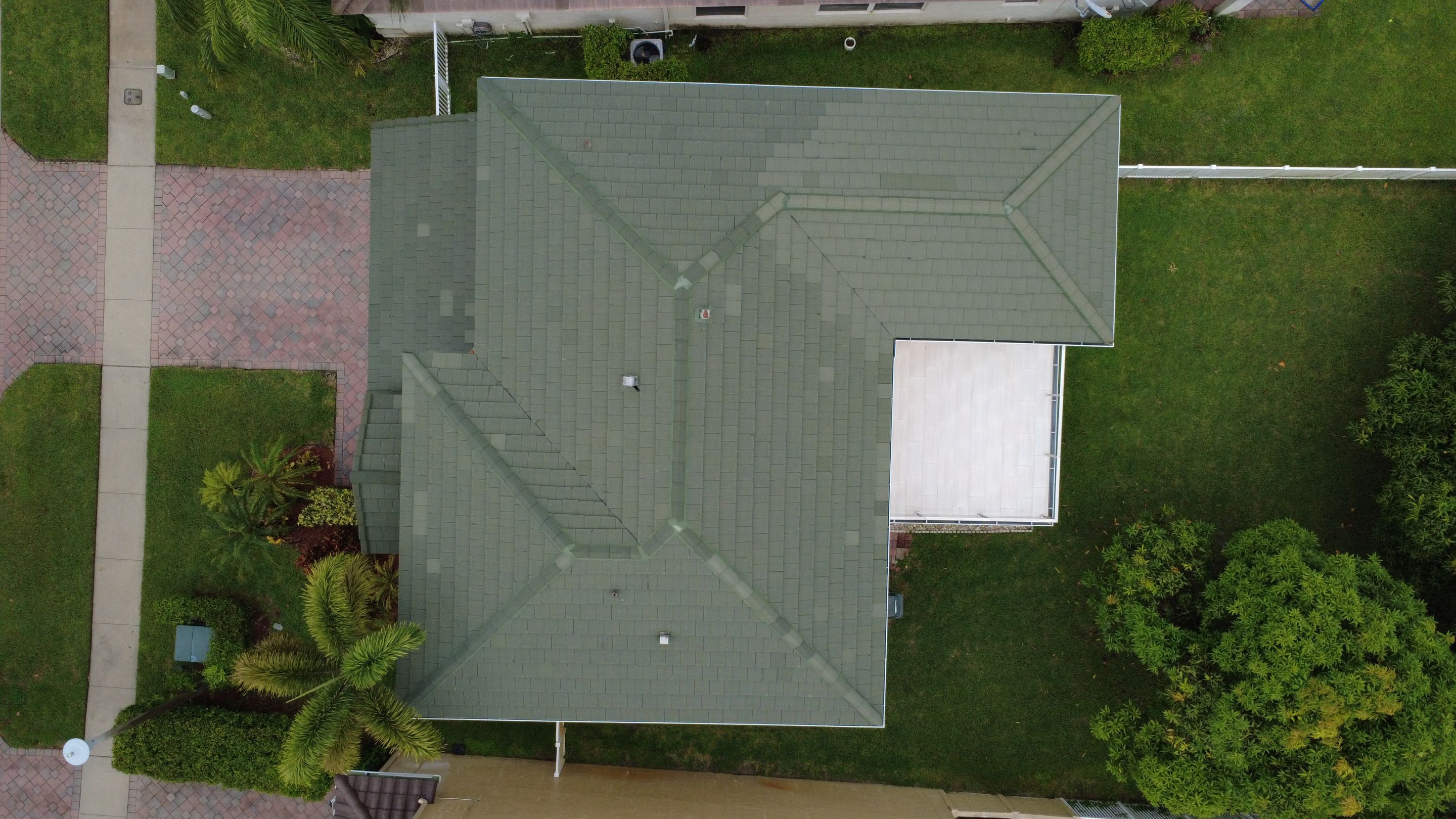 Residential Roofing Installation using 1" Nail strip metal roof by BLUES BROTHERS CONSTRUCTION CORP