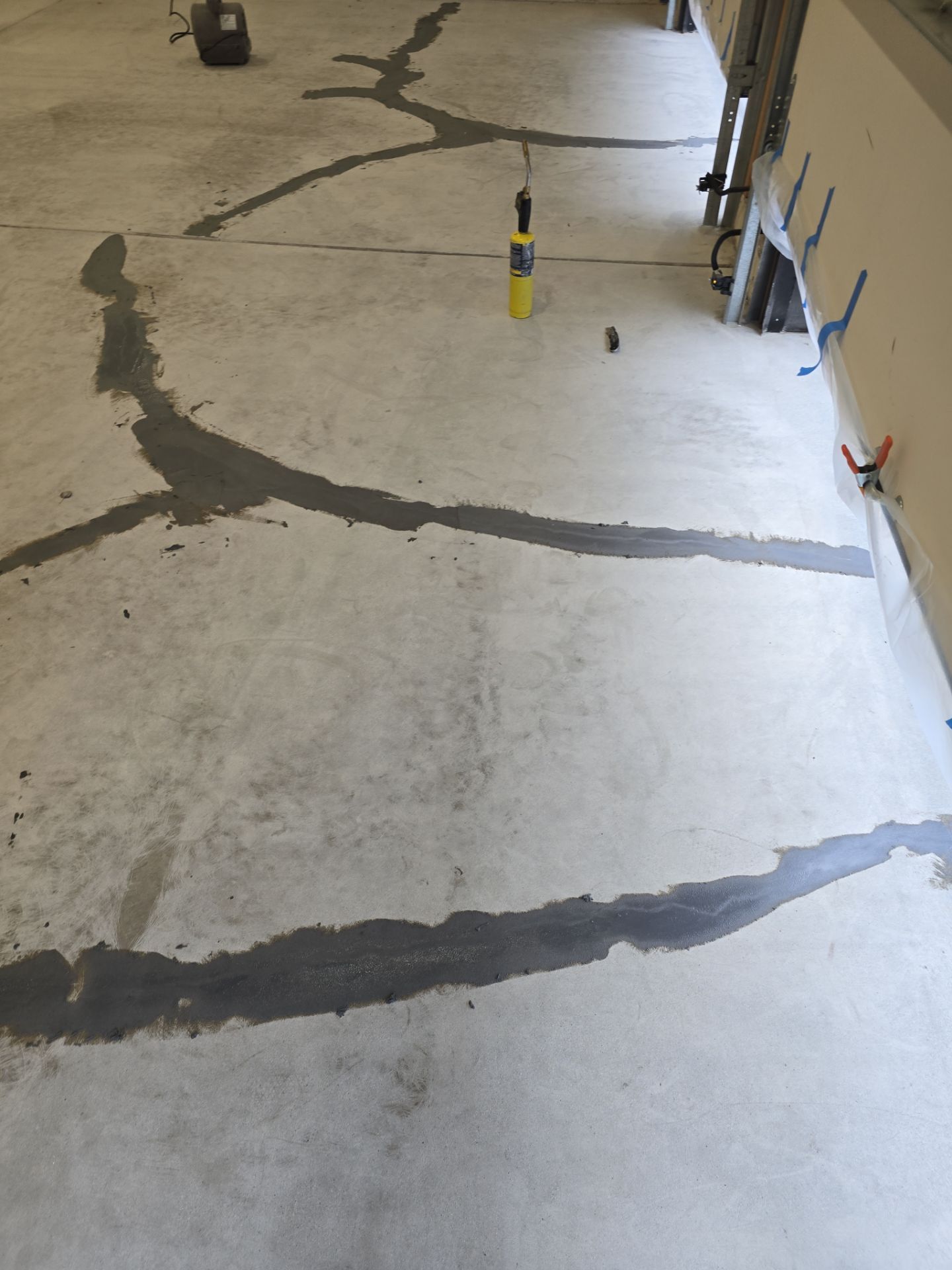 Garage Transformation using Slate Hybrid by Croc Coatings, LLC