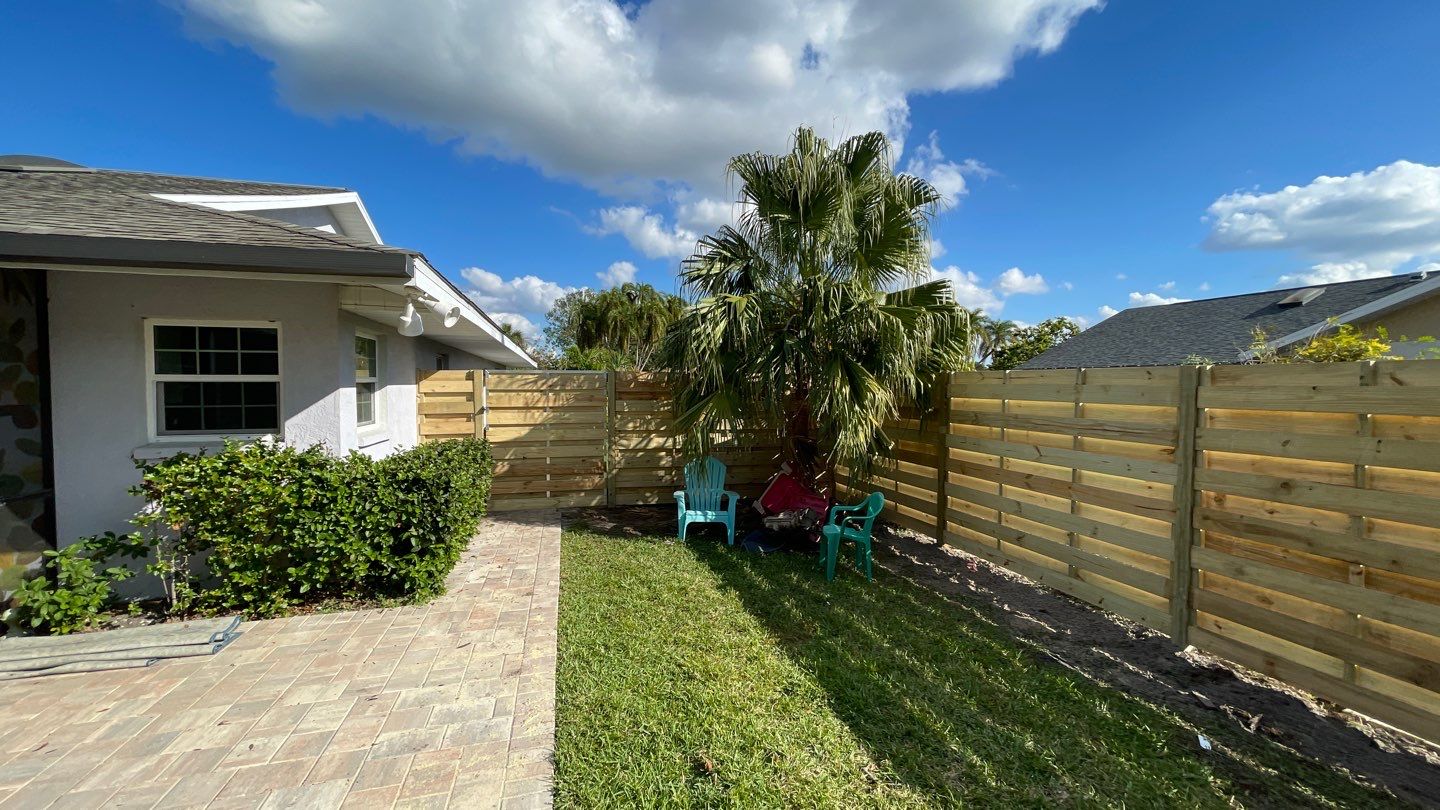 Wood Fence Installation using Shadowbox Wood Fence by Asap fence and gates, LLC