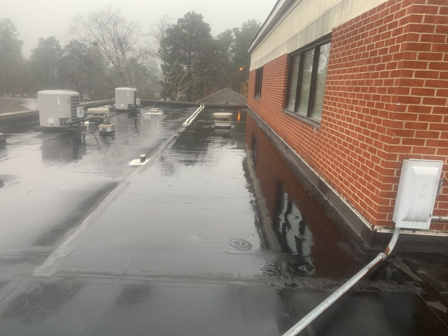 Re Roof (TPO) by American Roofing NC