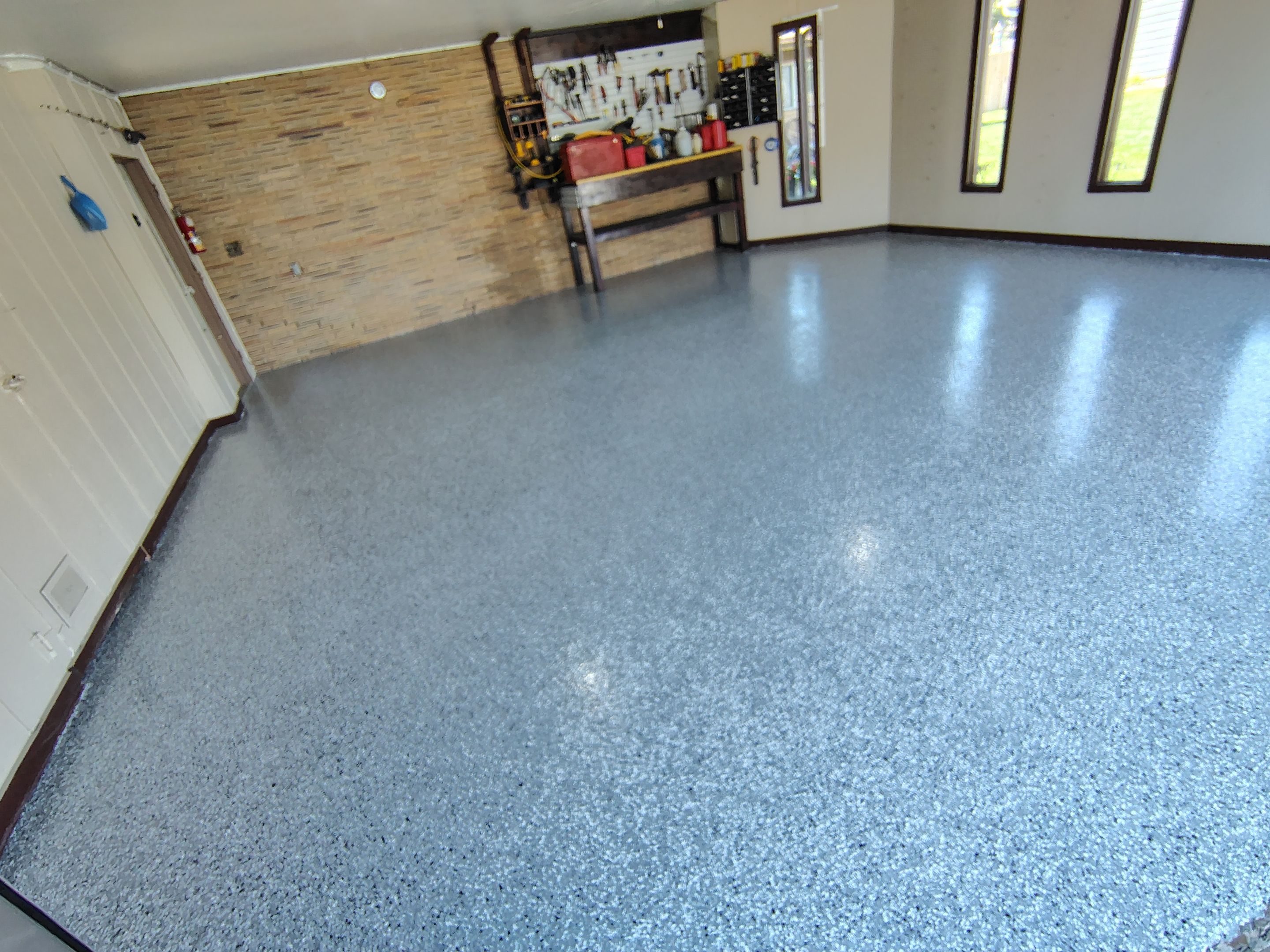 Garage Floor Coating with Crack Repair in Yankton by Select Painting, Coatings & Garage Cabinets