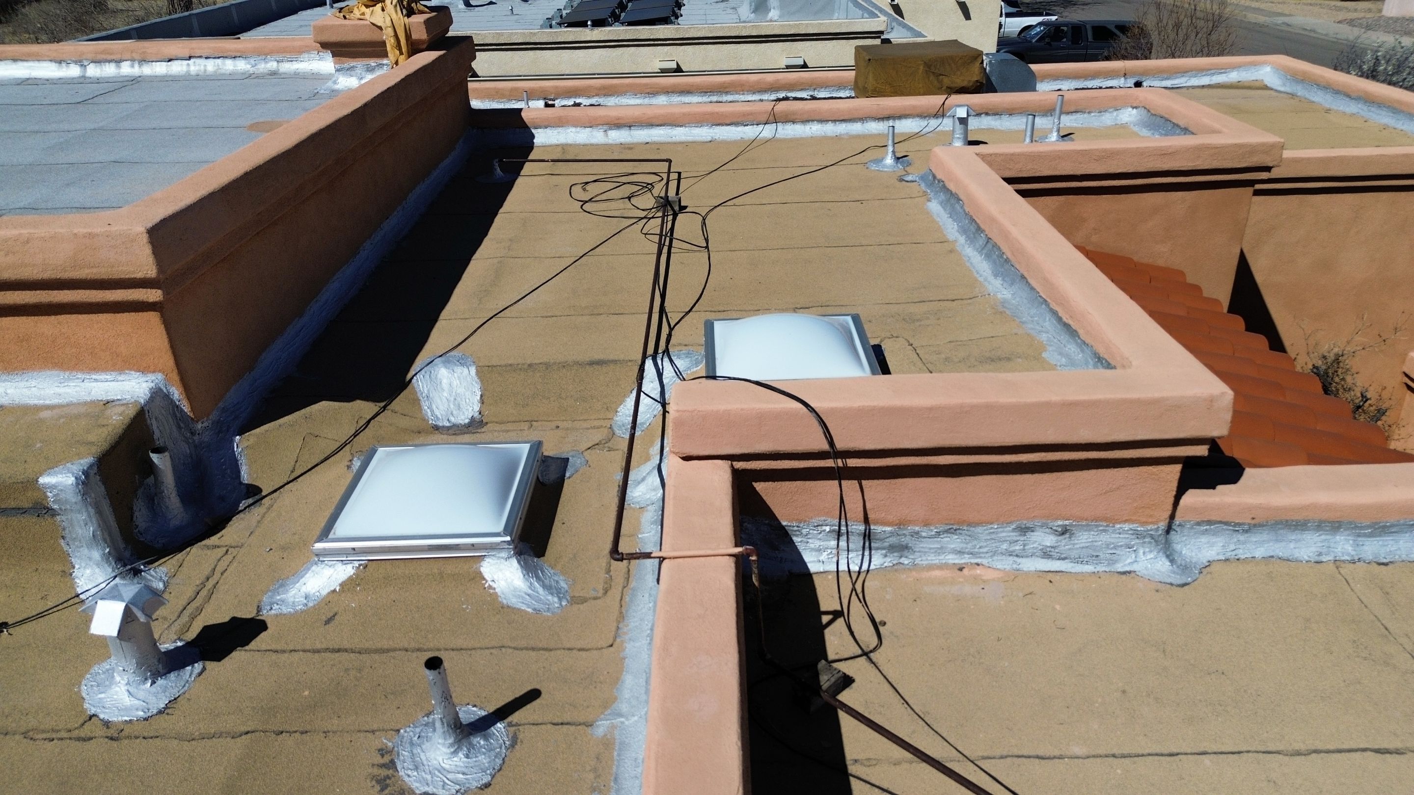 Residential TPO Flat Roof Replacement and Skylight Installation in Albuquerque by Doyle Roof Masters Inc