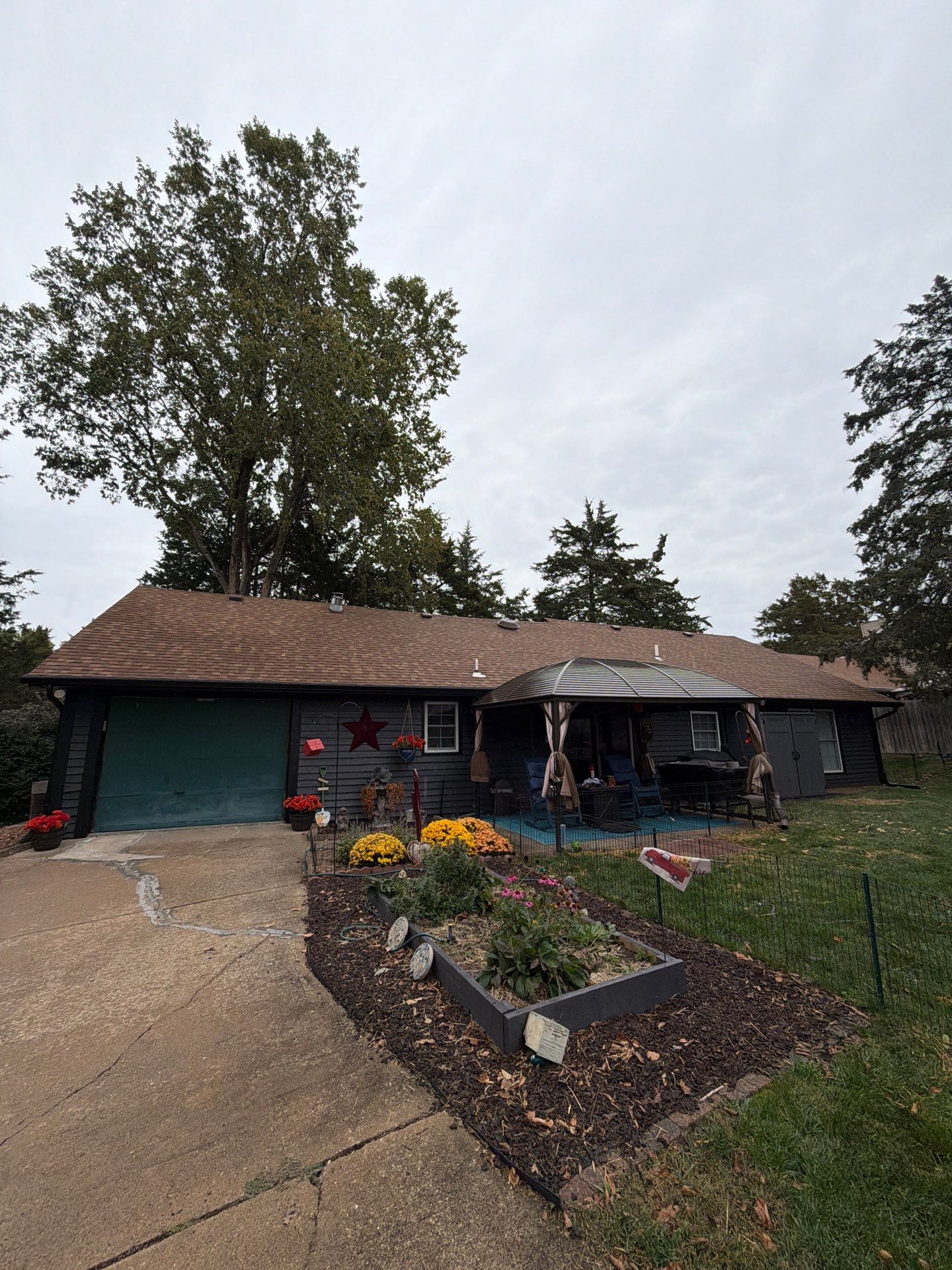 Wood siding refresh by Pezley Painting