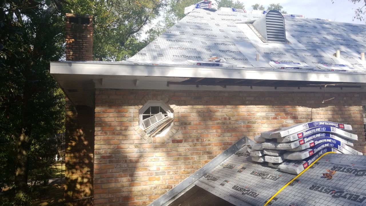 Residential Roofing Installation using Roof Replacement by American Roofing & Construction LLC