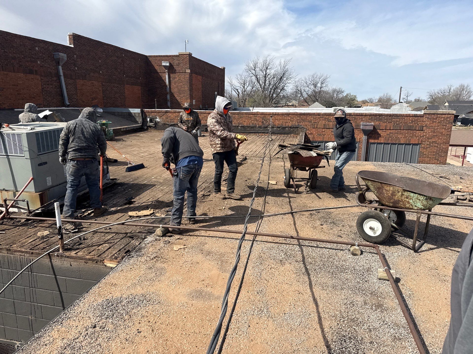 Hollis High School Comprehensive TPO Roof Replacement and Restoration by Secondary Rhodes