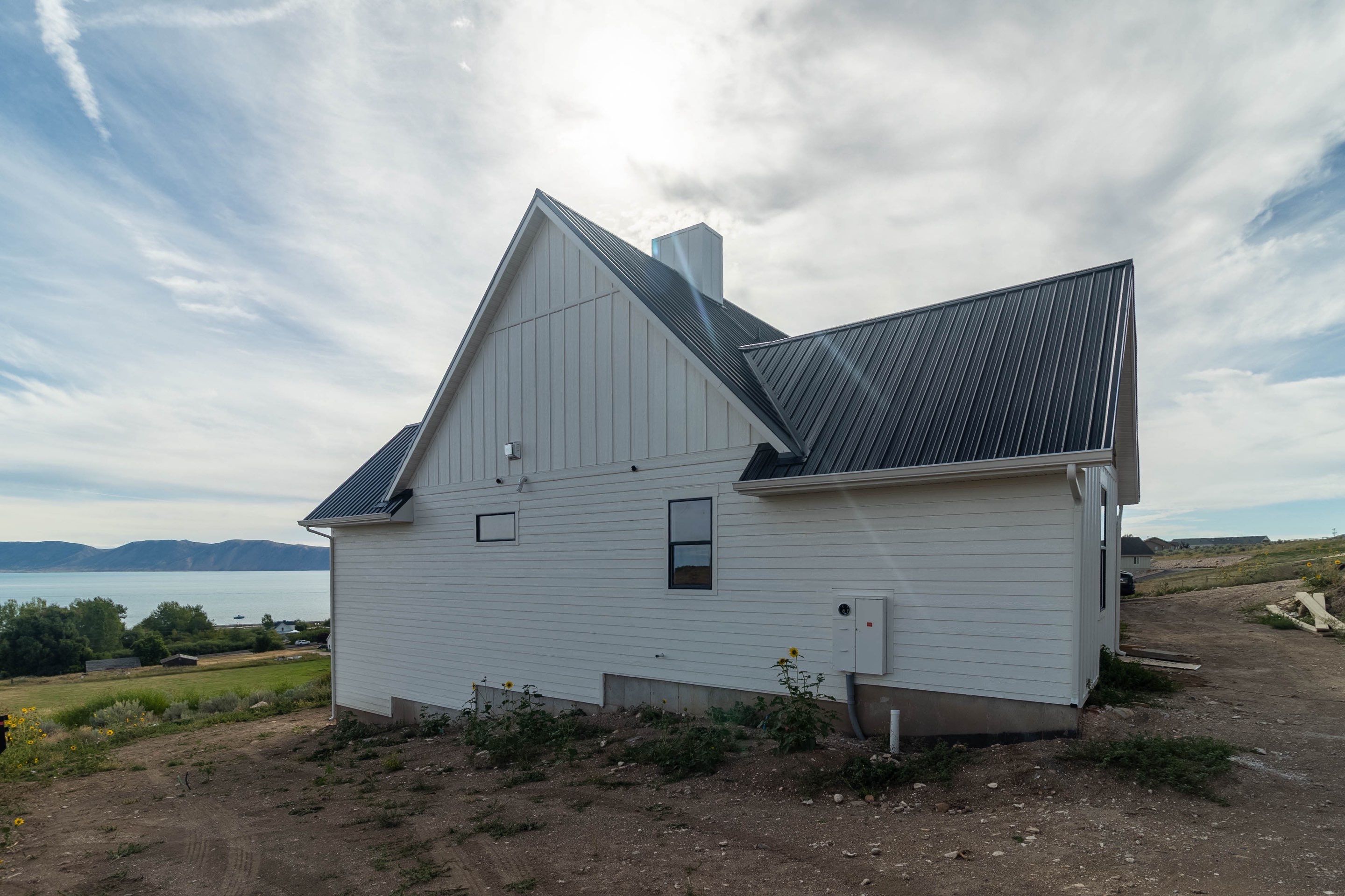 LP SmartSide Siding and Metal Roofing Installation in Garden City by Garner Construction