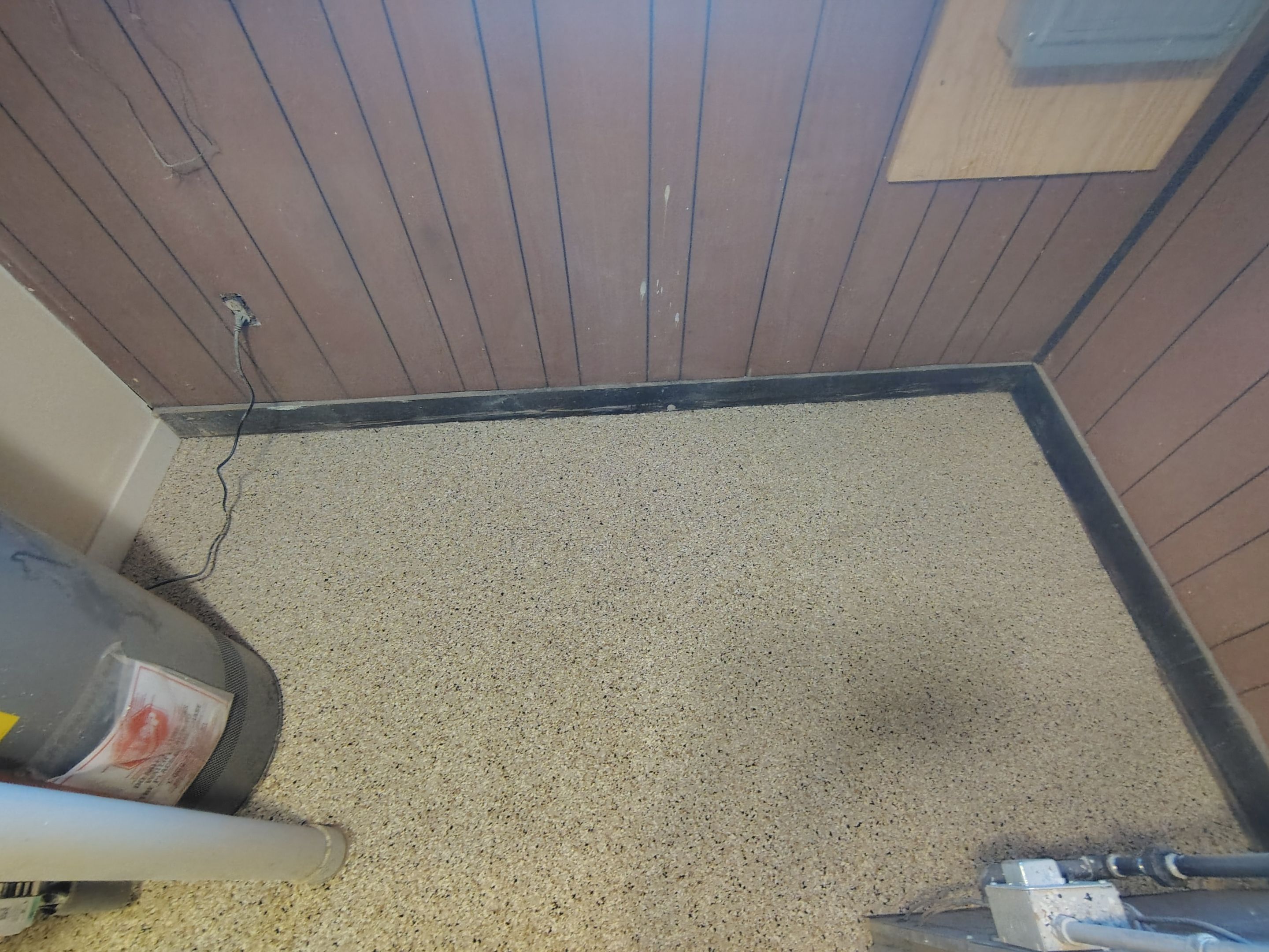 Comprehensive Basement Concrete Floor Coating and Crack Repair in Sioux Falls by Select Painting, Coatings & Garage Cabinets