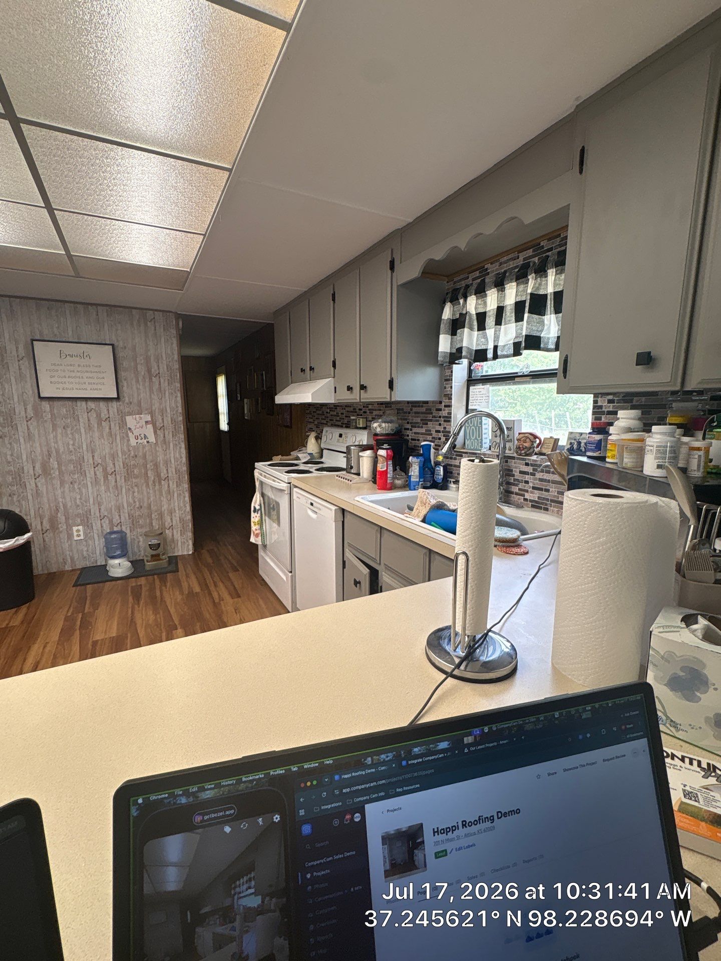 Attica Kitchen Remodel Featuring Gray Cabinets and Glass Tile Backsplash by CompanyCam Sales Demo