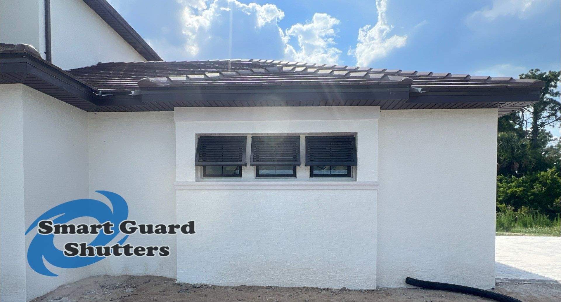 Decorative Bahamas in Umbra Grey by Smart Guard Shutters
