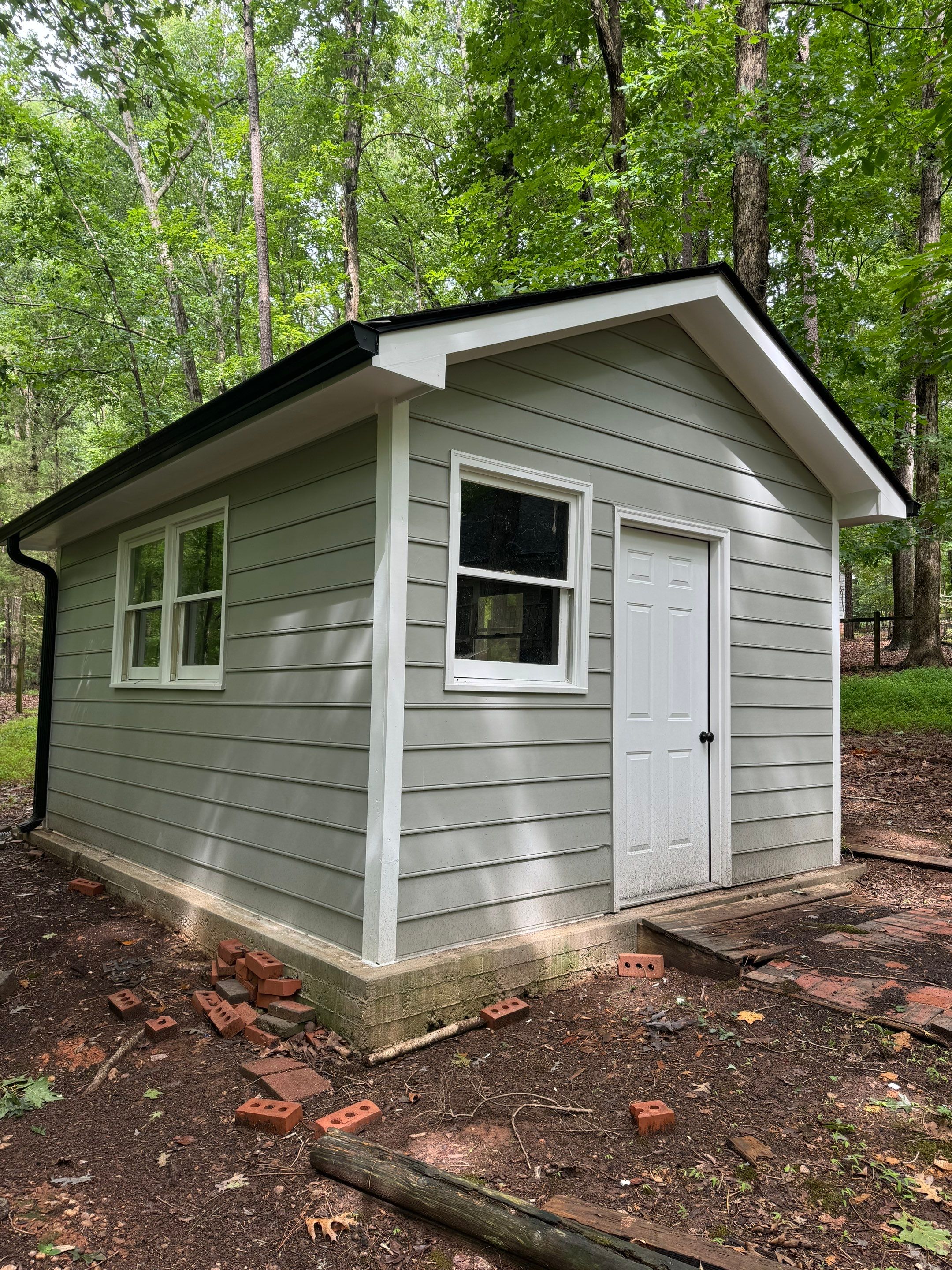 GAF Timberline HDZ Pewter Gray - 5” Black Gutters  by Pro Performance Roofing