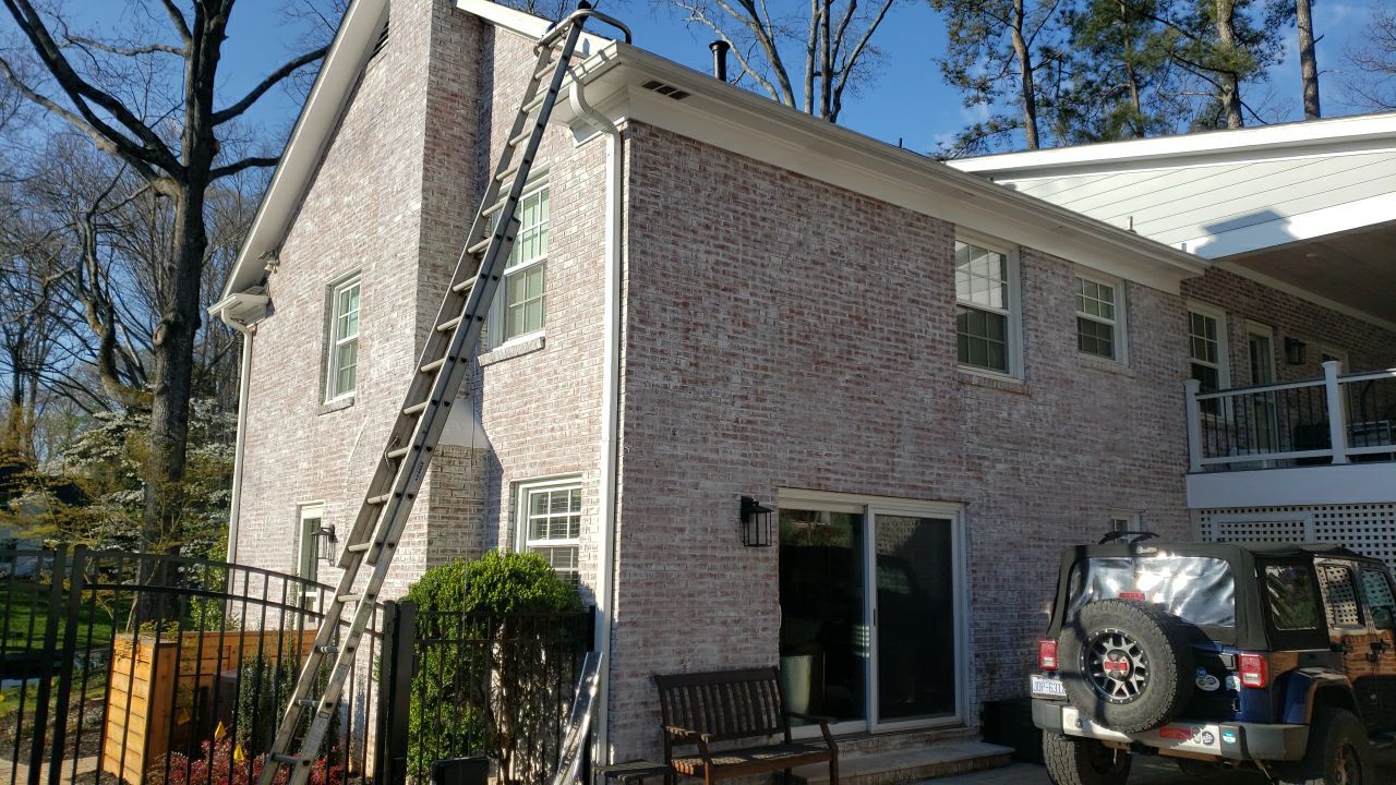 Gutter Cleaning using water by Power Wash Masters LLC