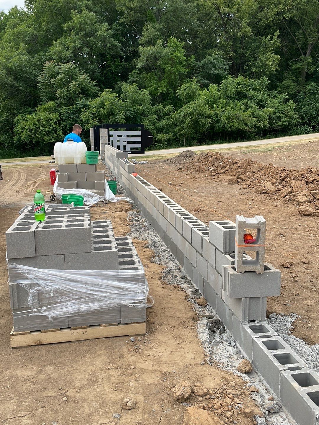 Fence / Retaining Wall using Block then parge by ACE Waterproofing & Basement Solutions