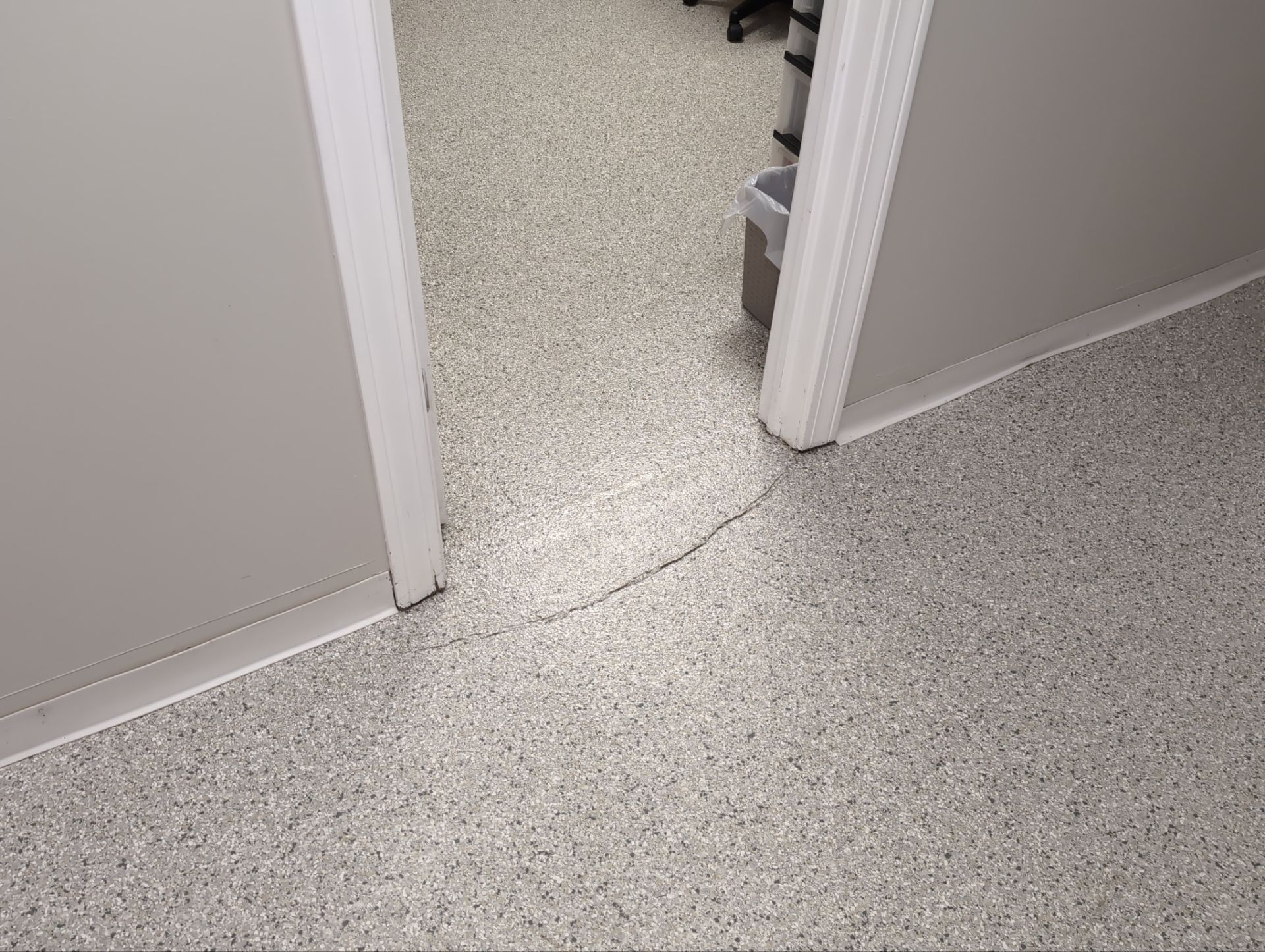 Medina Cracked basement floor with Epoxy by Beck Restoration Management Group