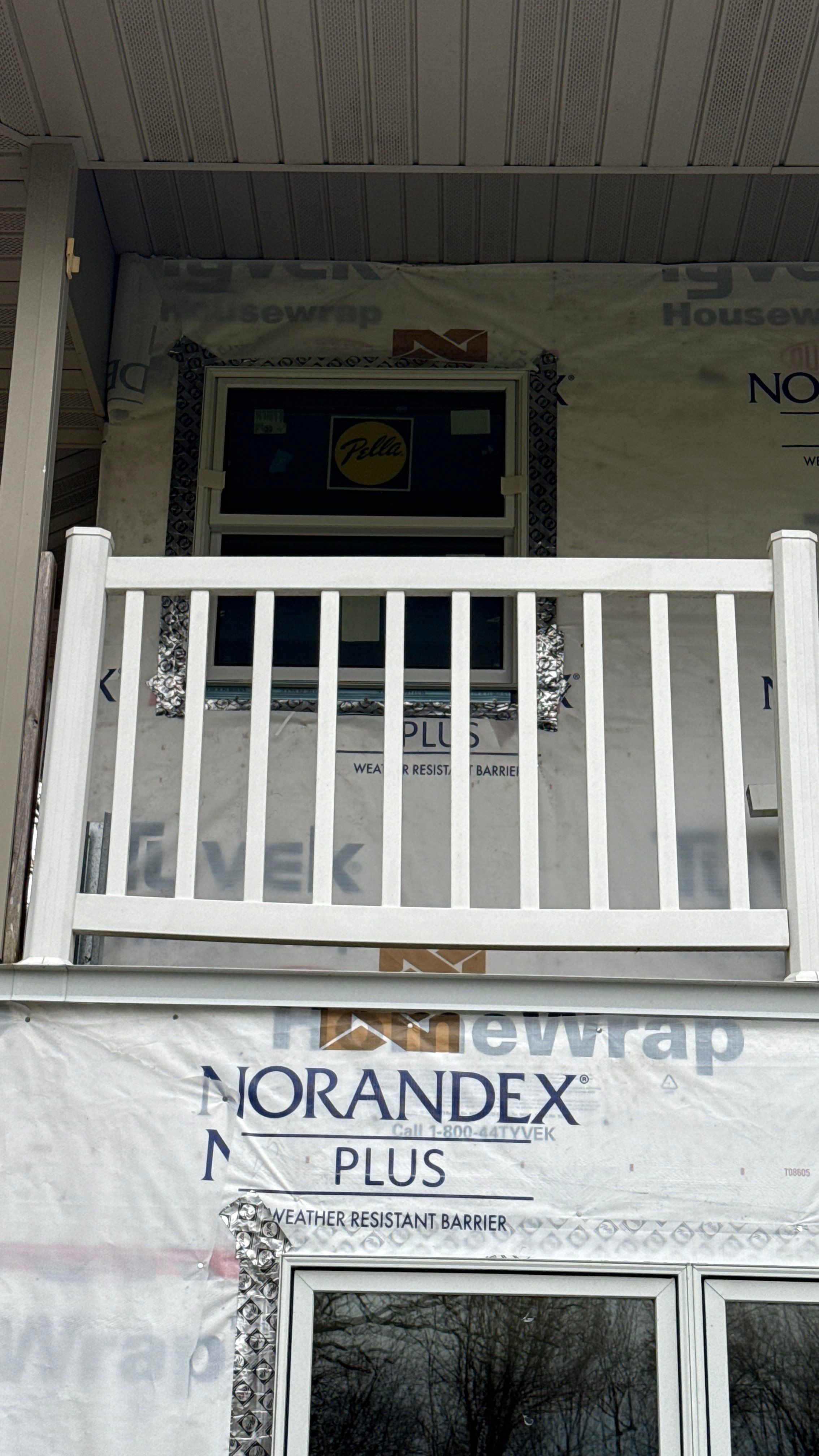 A Clean Window Upgrade Ready for New Siding with Pella Lifestyle Series by United Windows and Siding LLC