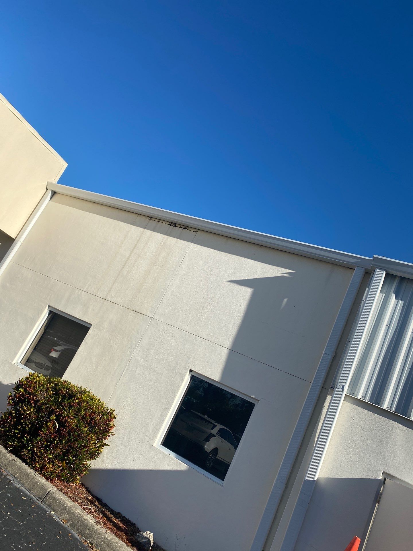 White 6-Inch Gutters with Downspouts in Bradenton FL by Gutter Professors