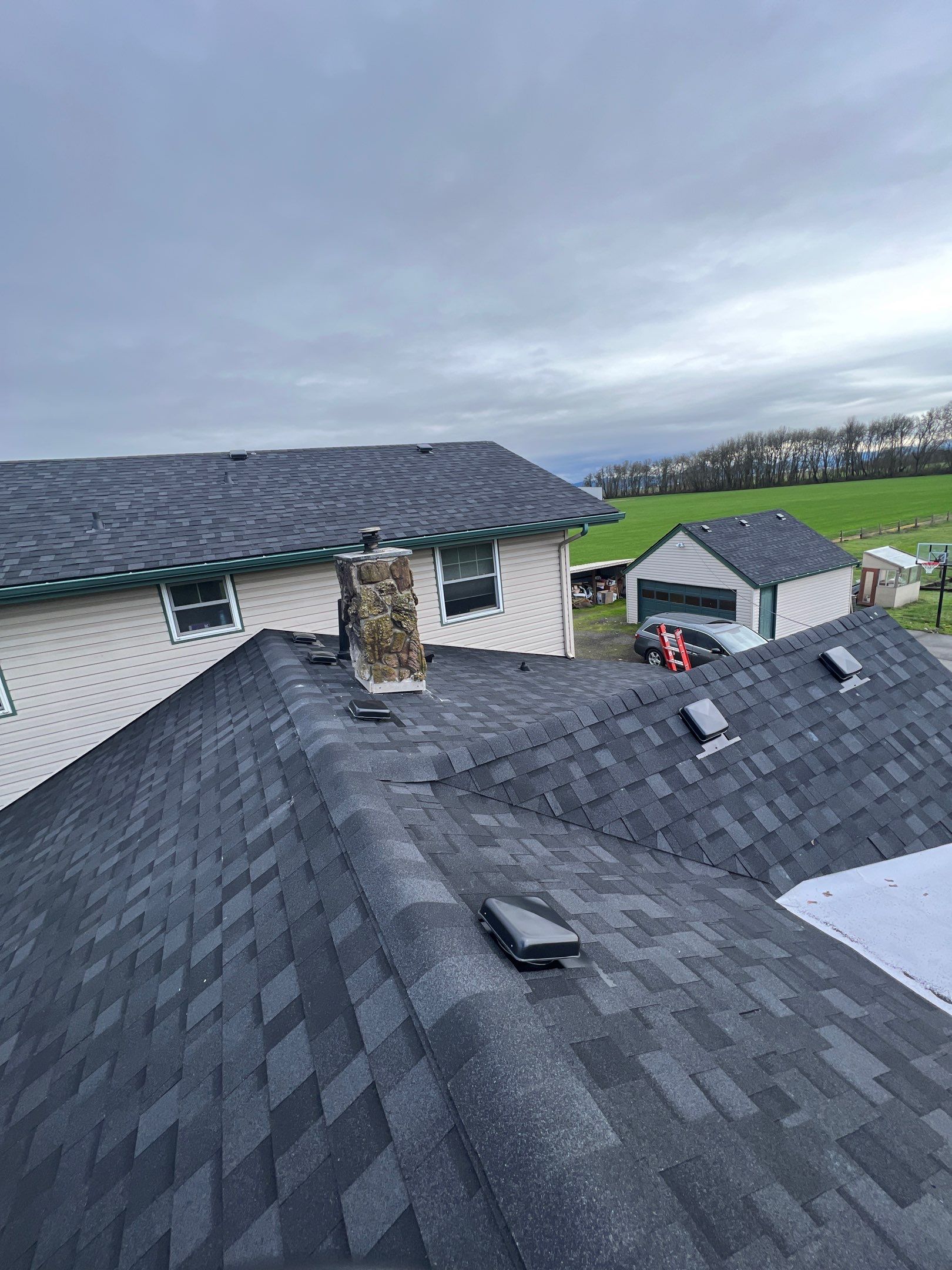 Residential Roofing Installation using IKO Dynasty (Color: Granite Black) by Orezona Building & Roofing Company, Inc.