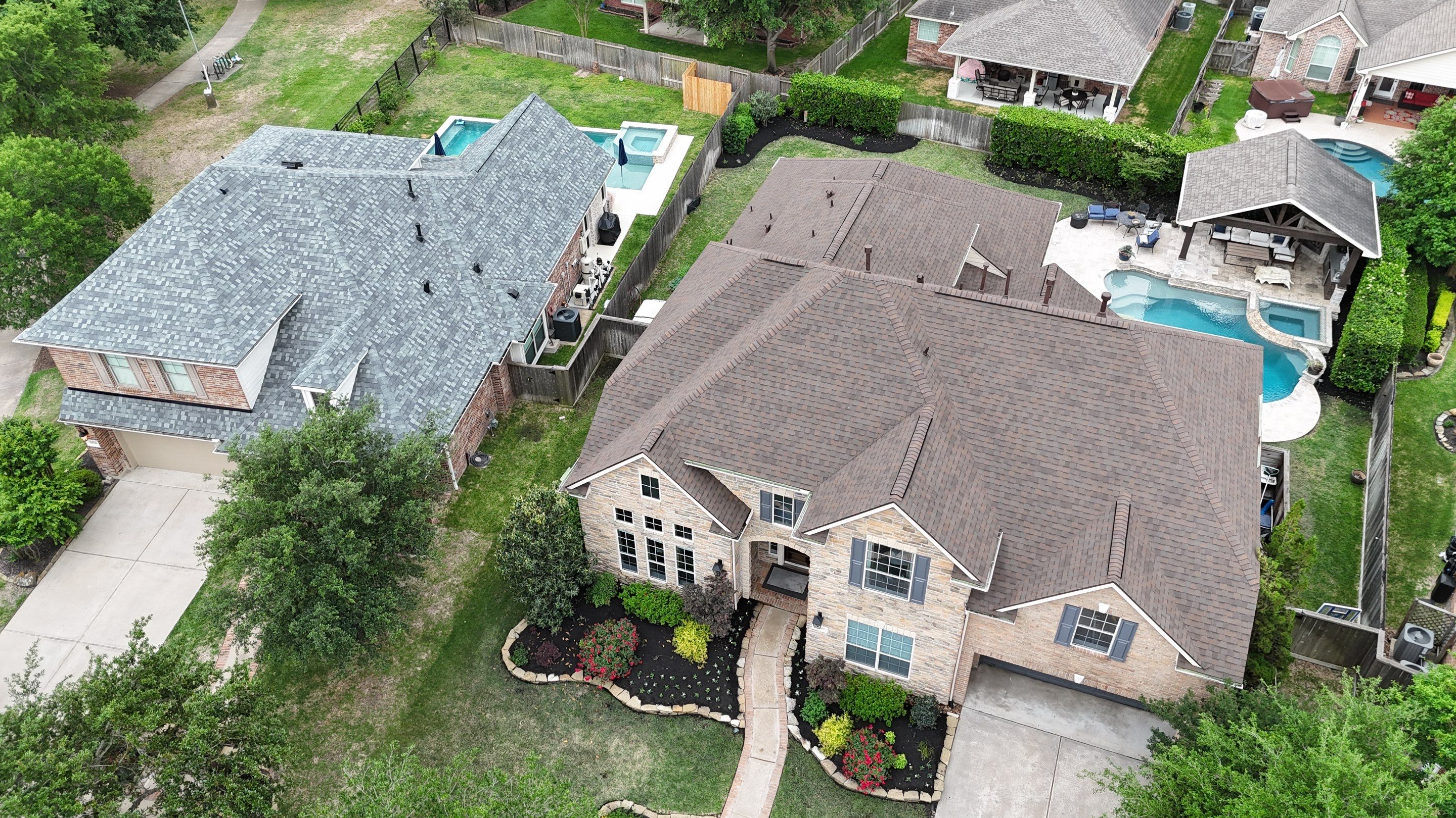 Residential Roofing Installation of 2 neighbors in Bridgeland by Core Four Roofing