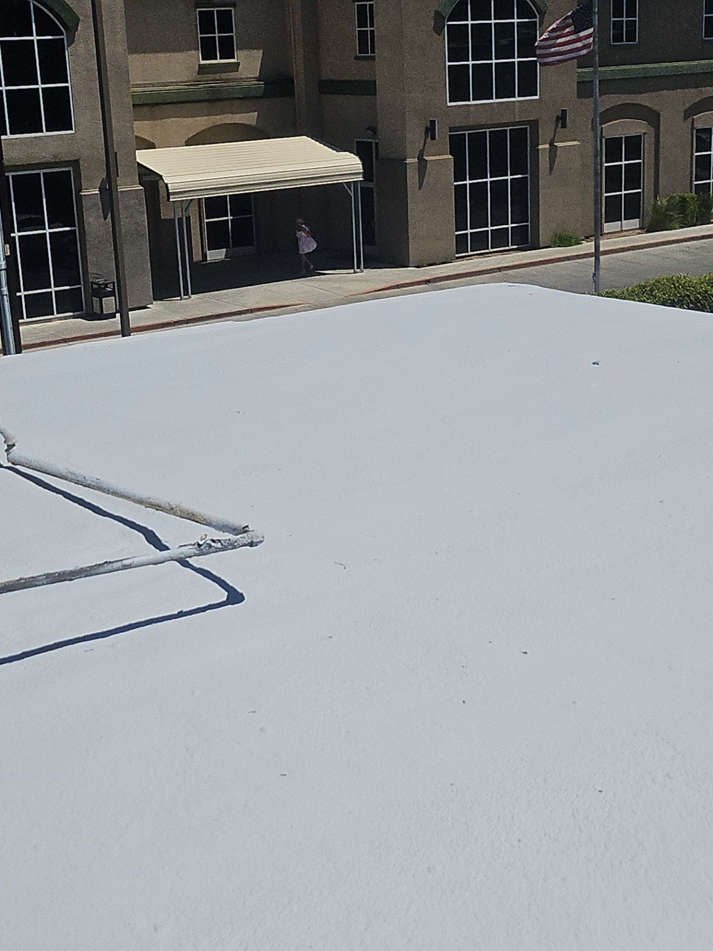 Foam Refurbish using General Coatings acrylic coatings and spray foam by Straight Edge Roofing Inc