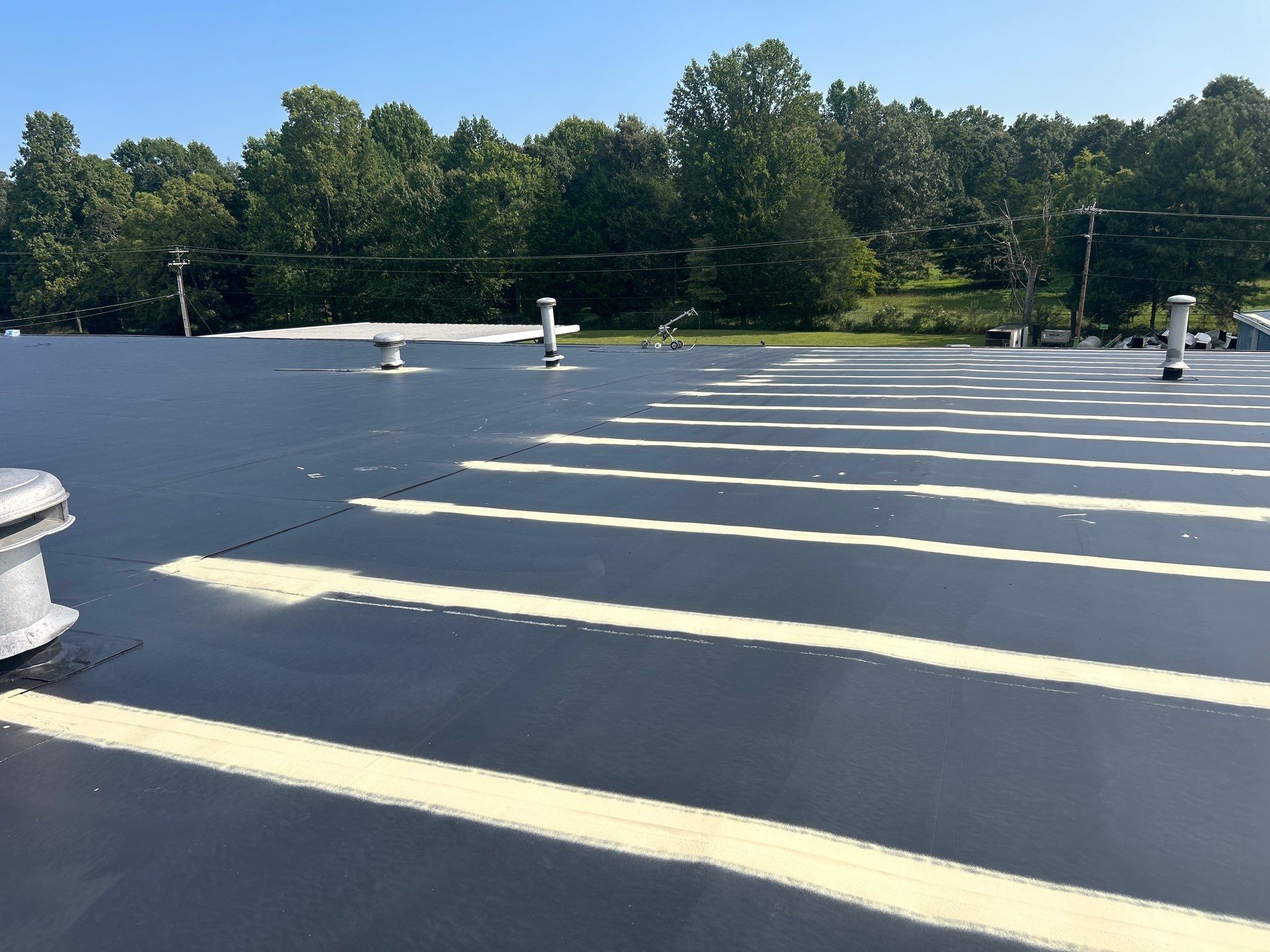 Commercial Roofing Installation using Coatings by Kentucky Commercial Roofing