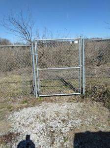 Chain Link Fence Repair and Custom Gate Installation – East St. Louis, IL by Legendary Services Company LLC.