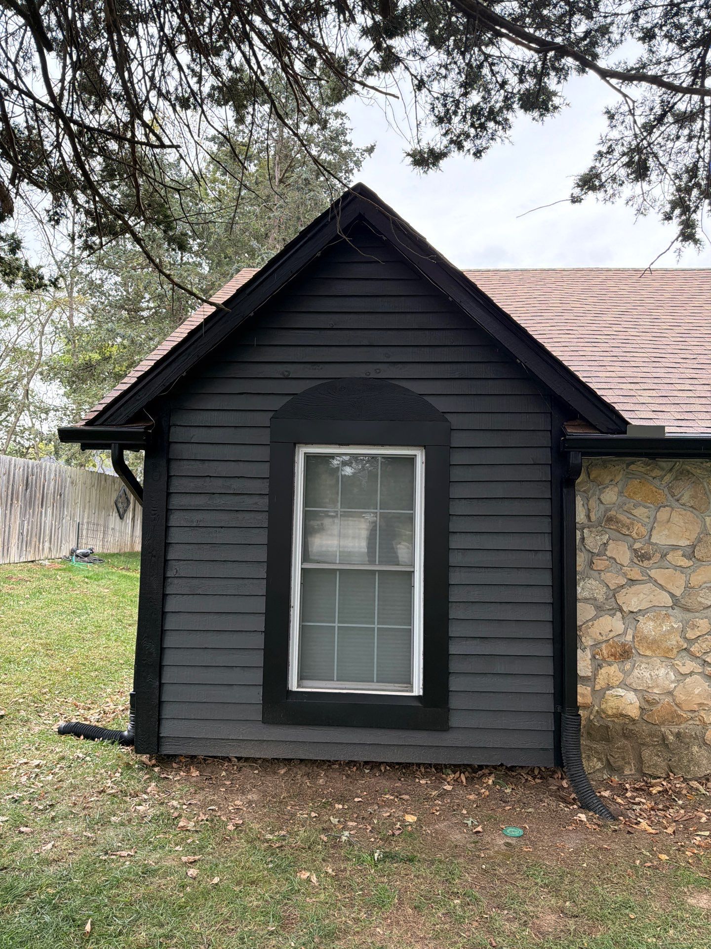 Wood siding refresh by Pezley Painting